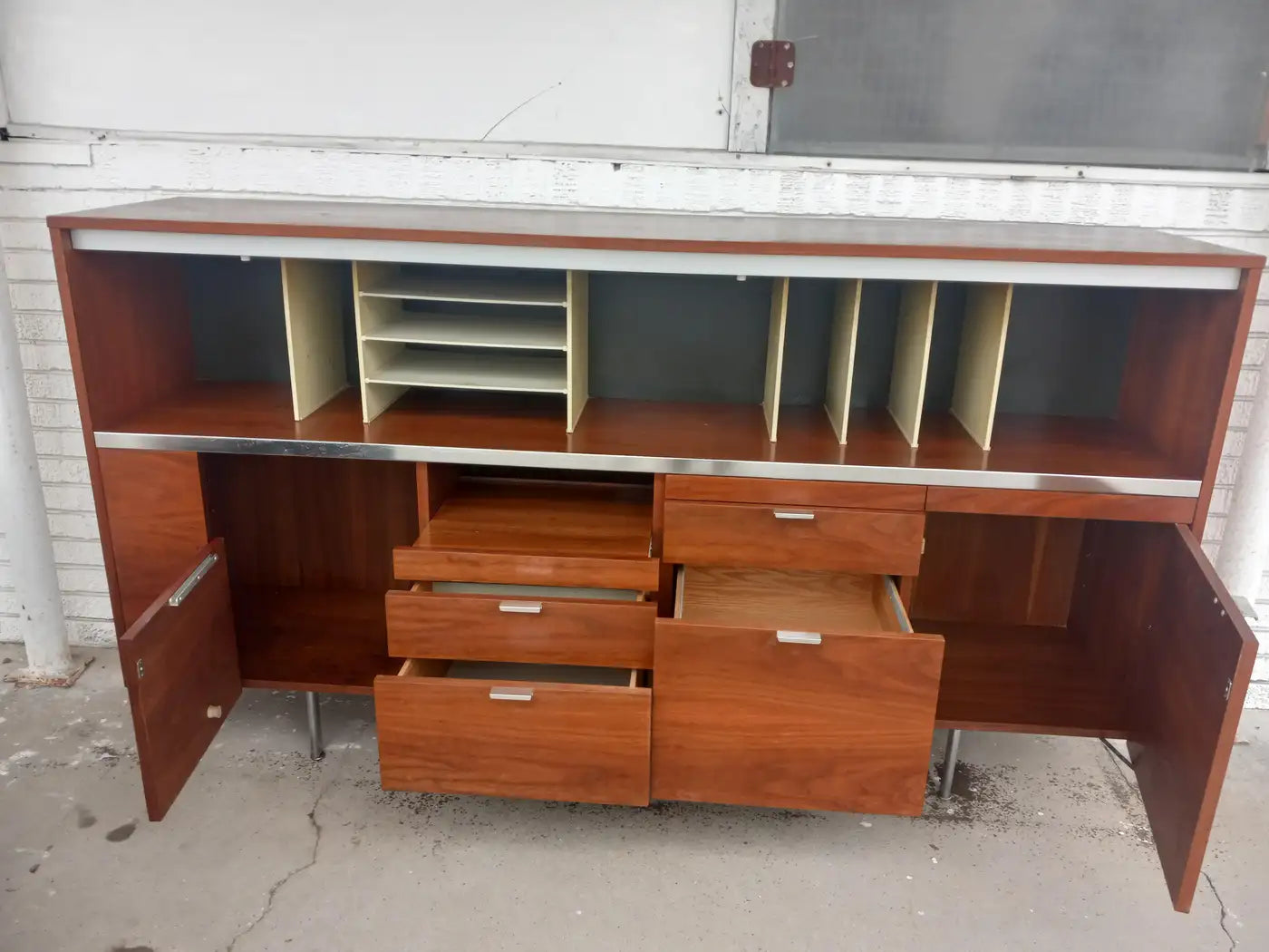Elegant George Nelson walnut credenza and desk combo.