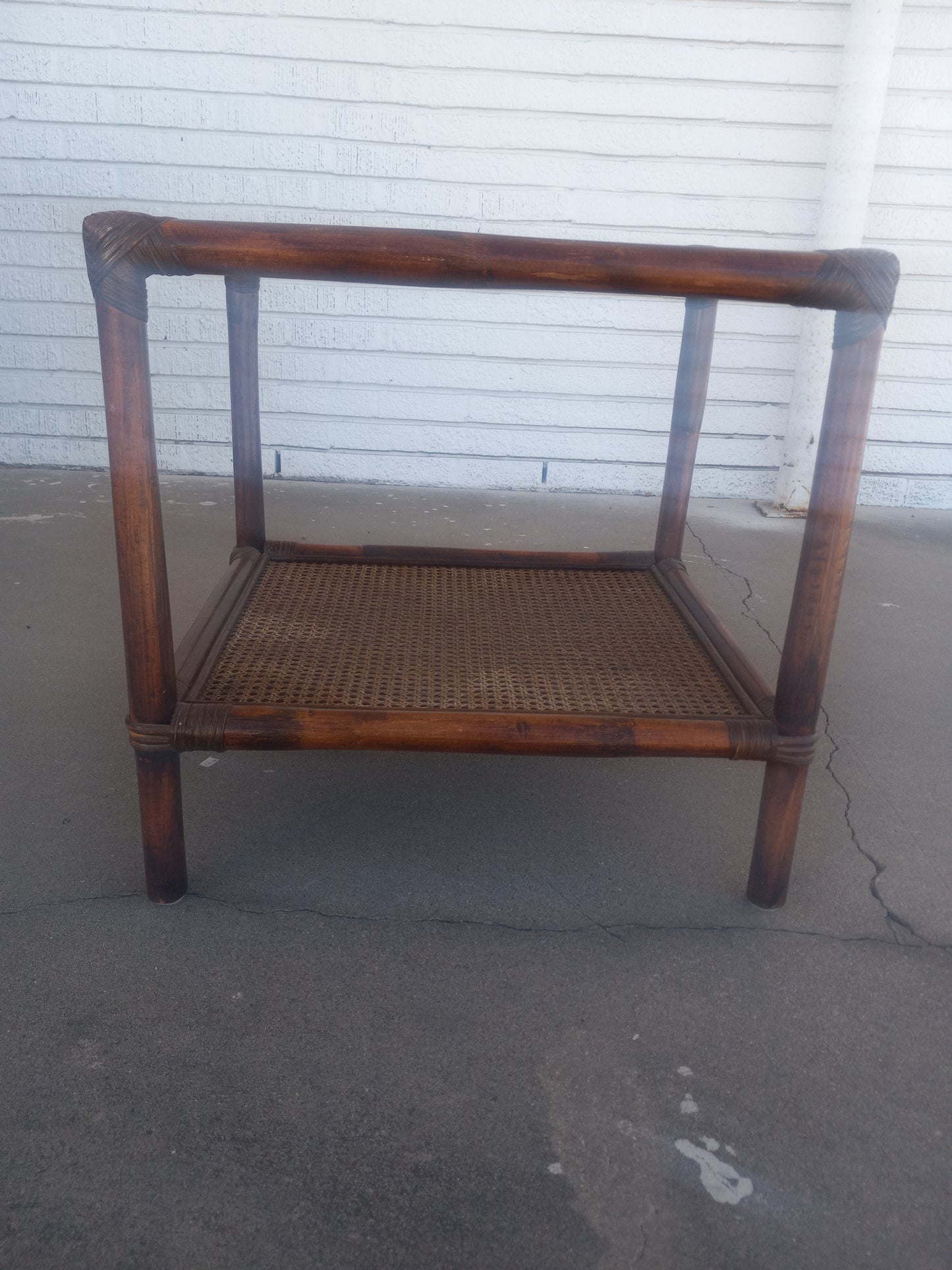 Coastal accent table with woven bamboo base