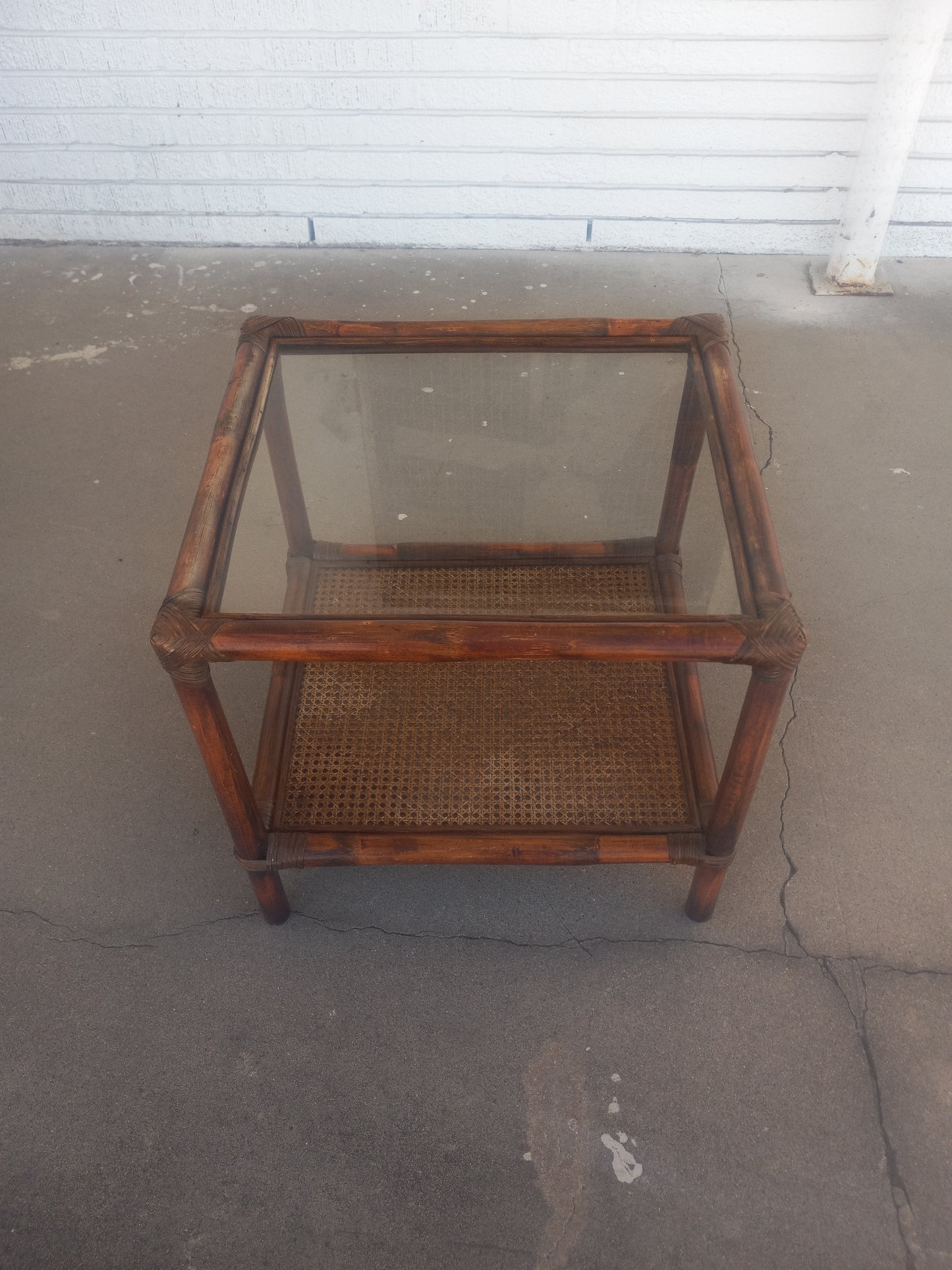 Boho style bamboo side table with glass top