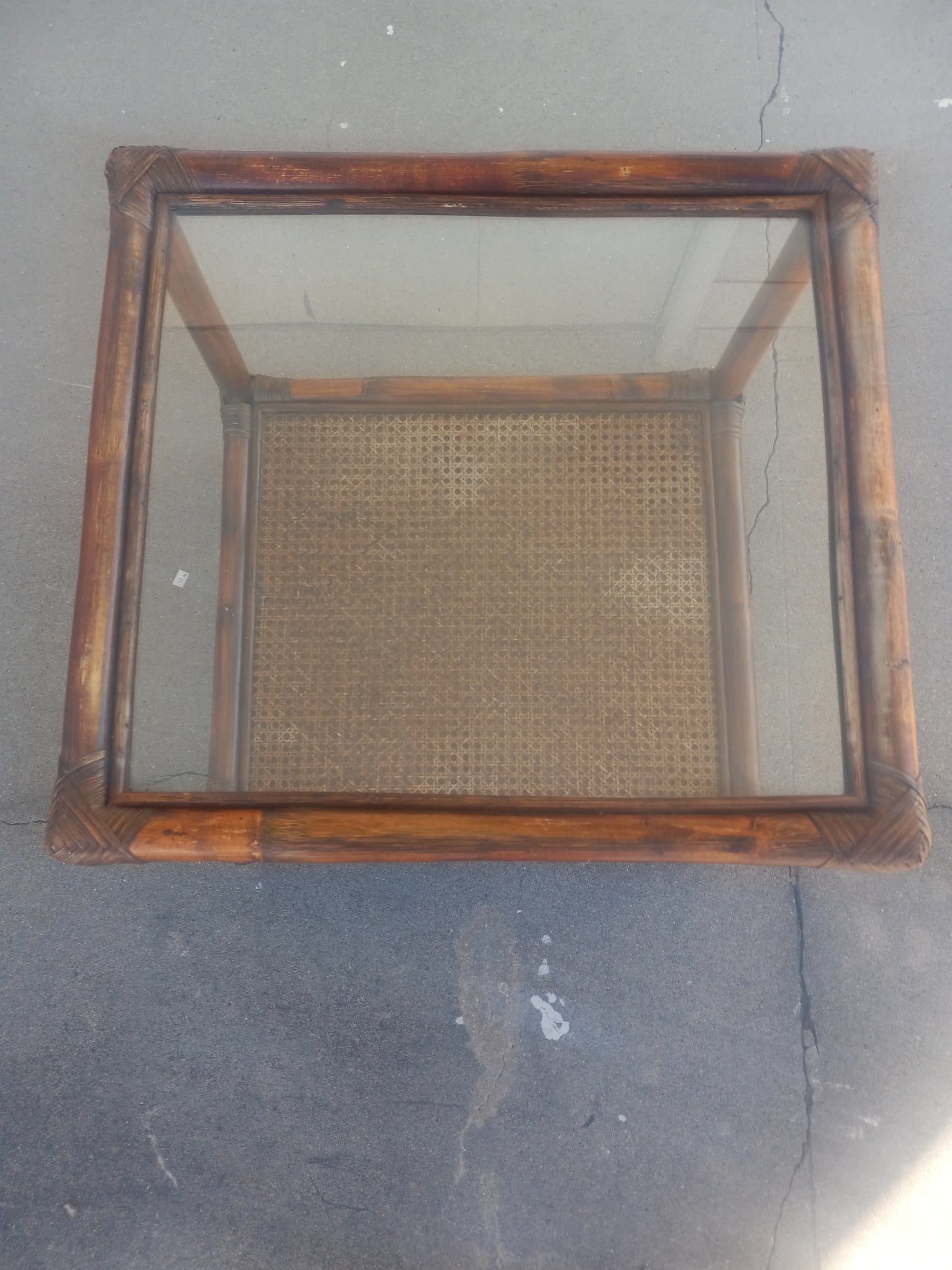 Glass and bamboo side table for coastal interiors