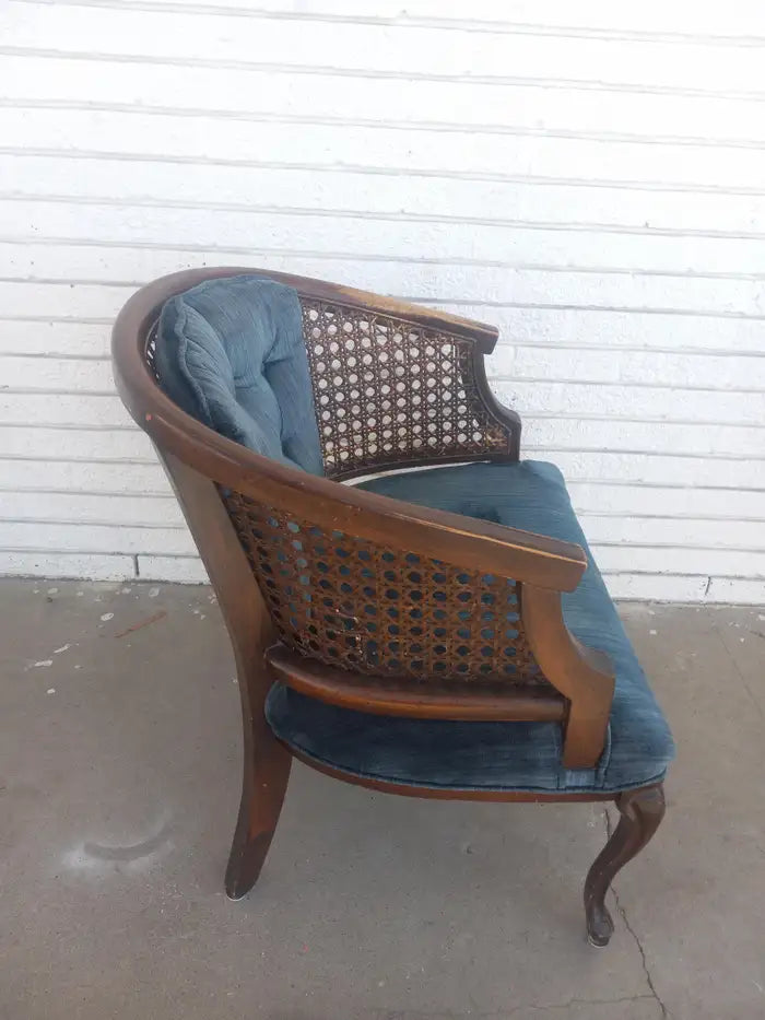 Timeless vintage round back cane arm chairs for vintage lovers.