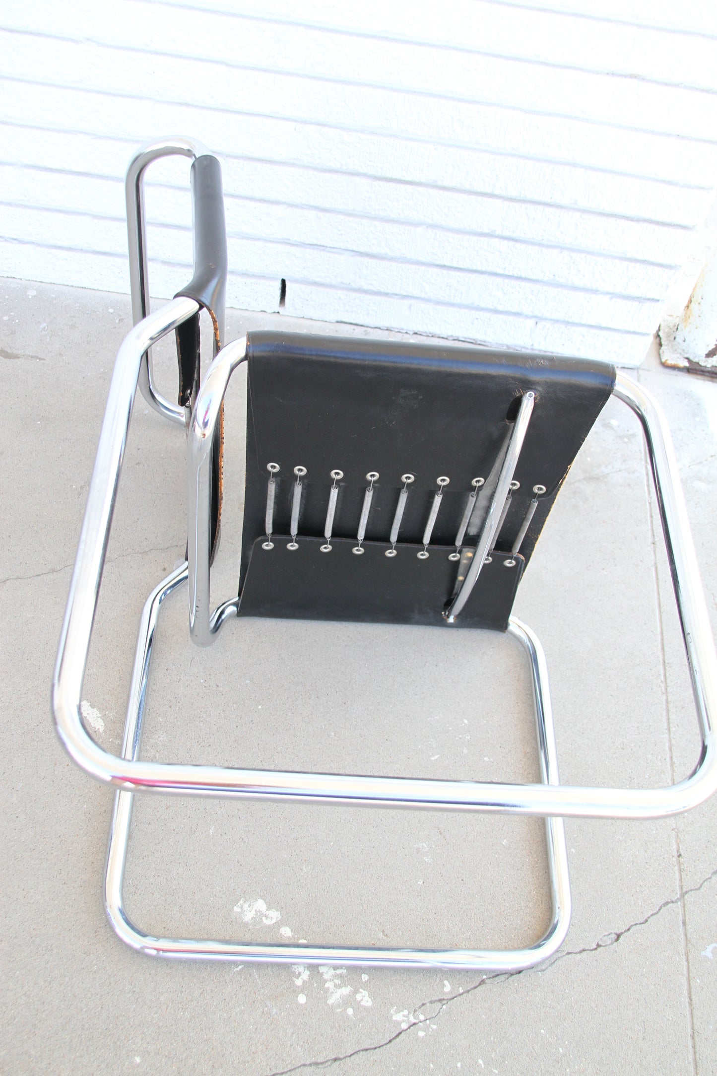 Luxury Zographos chair with black leather upholstery