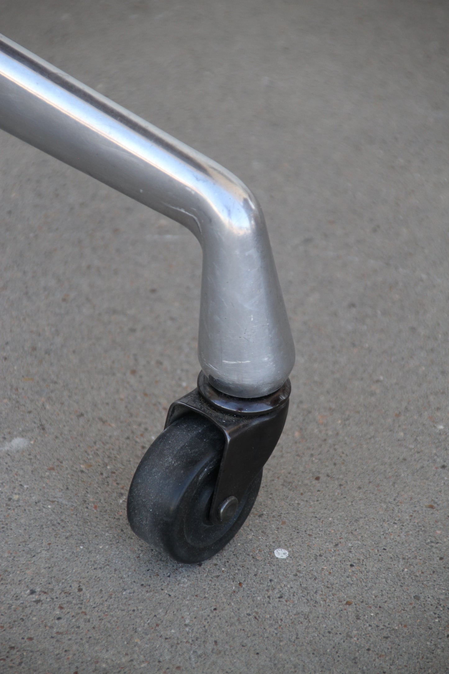 Eames table with metal legs and casters
