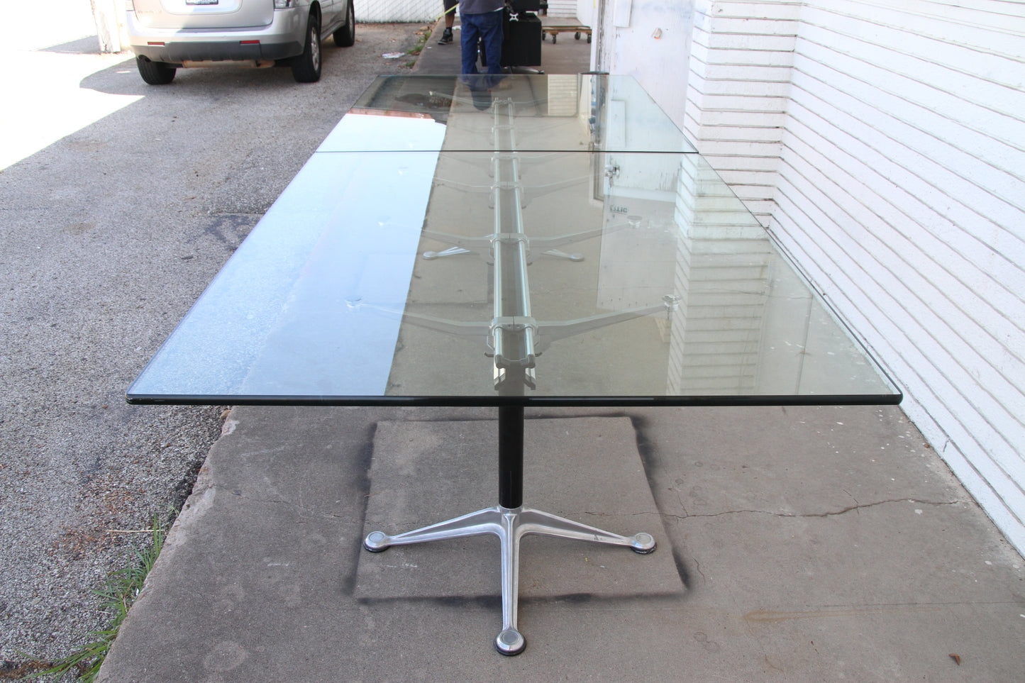 Side view of vintage Burdick glass table