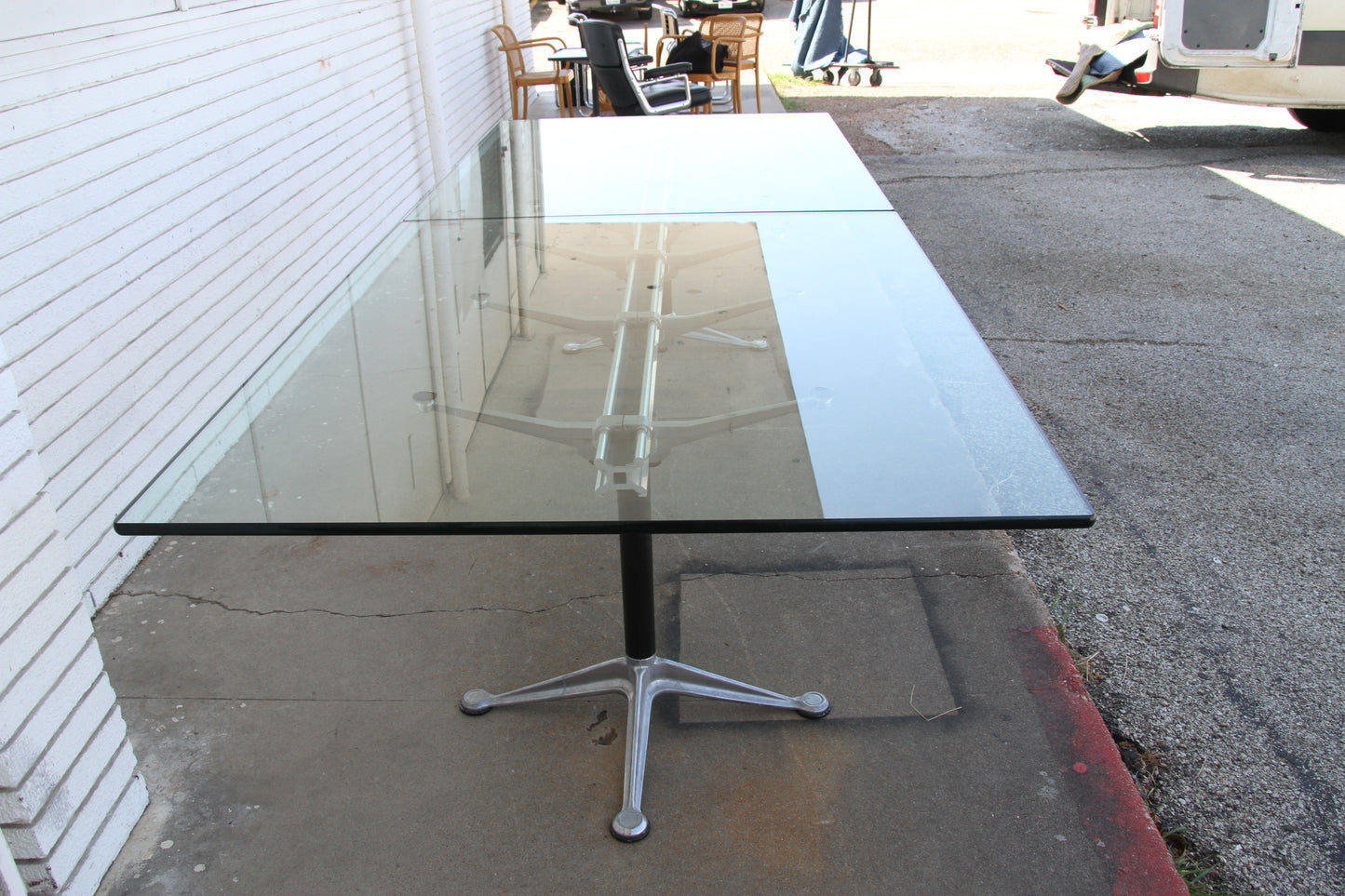 Burdick table with polished metal frame