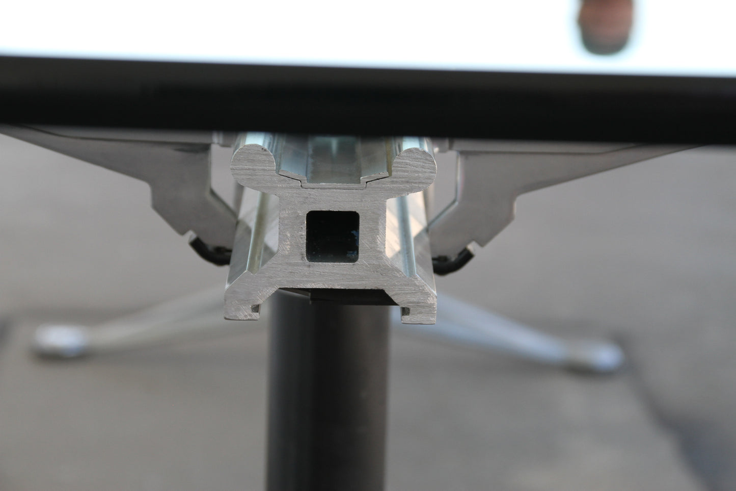 Industrial-style Burdick glass table