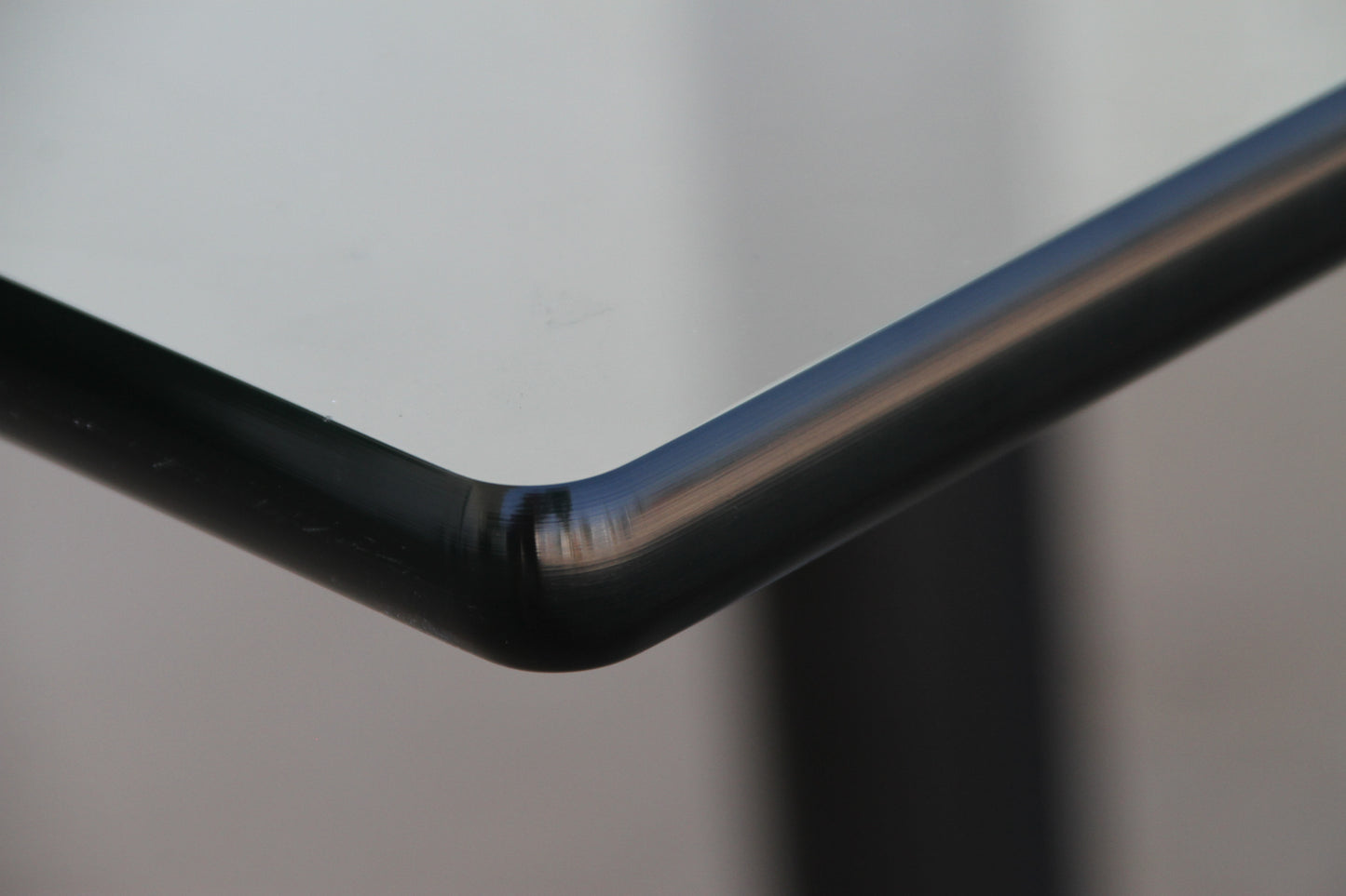 Minimalist glass table from Burdick Group