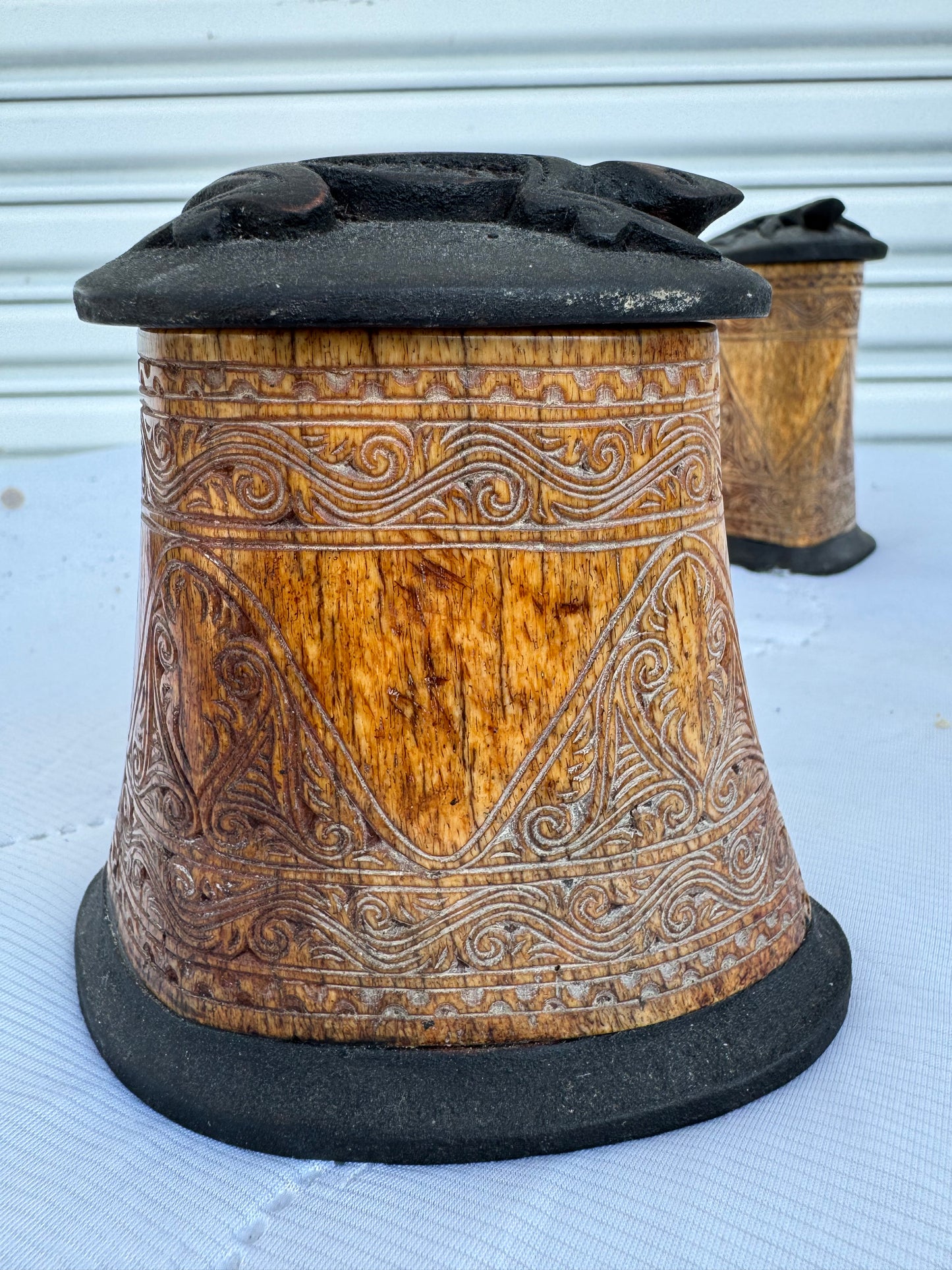 Artistic carved bone box with cultural patterns and smooth matte lid
