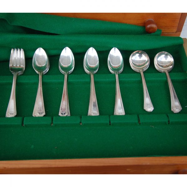 Wooden box with complete silverware set