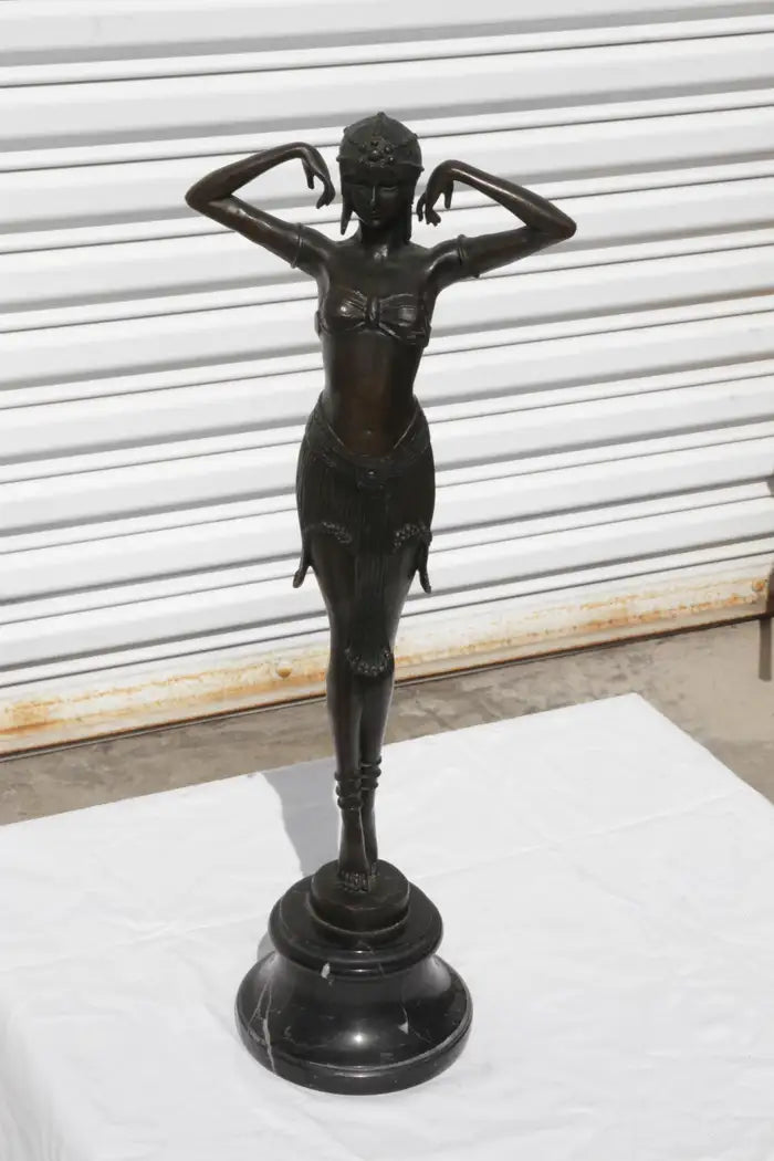 Metal ballerina sculpture with beautiful craftsmanship and detail
