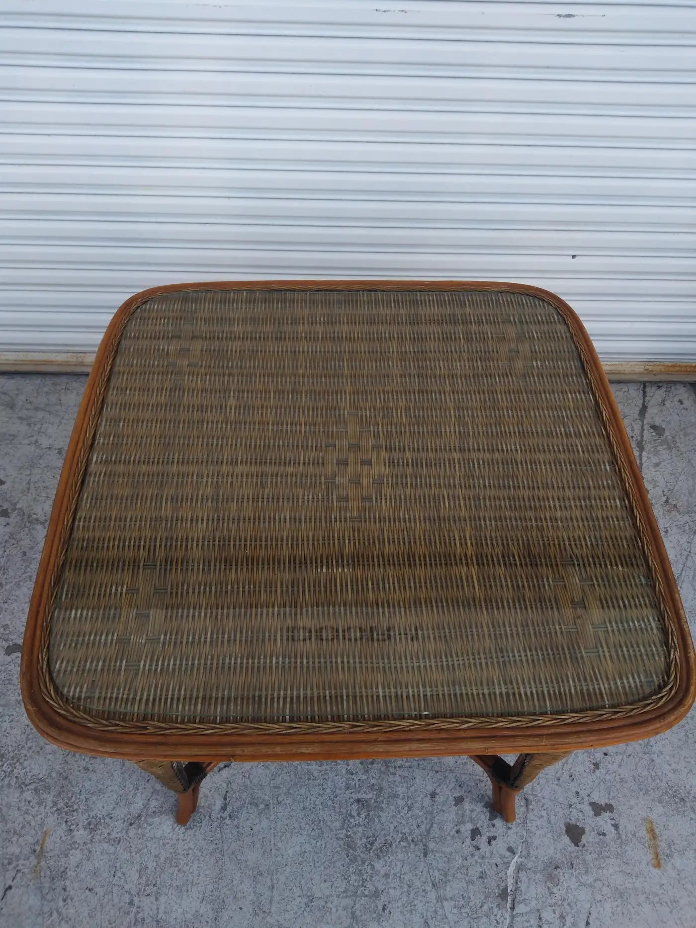 Close-up of handwoven rattan dining set details
