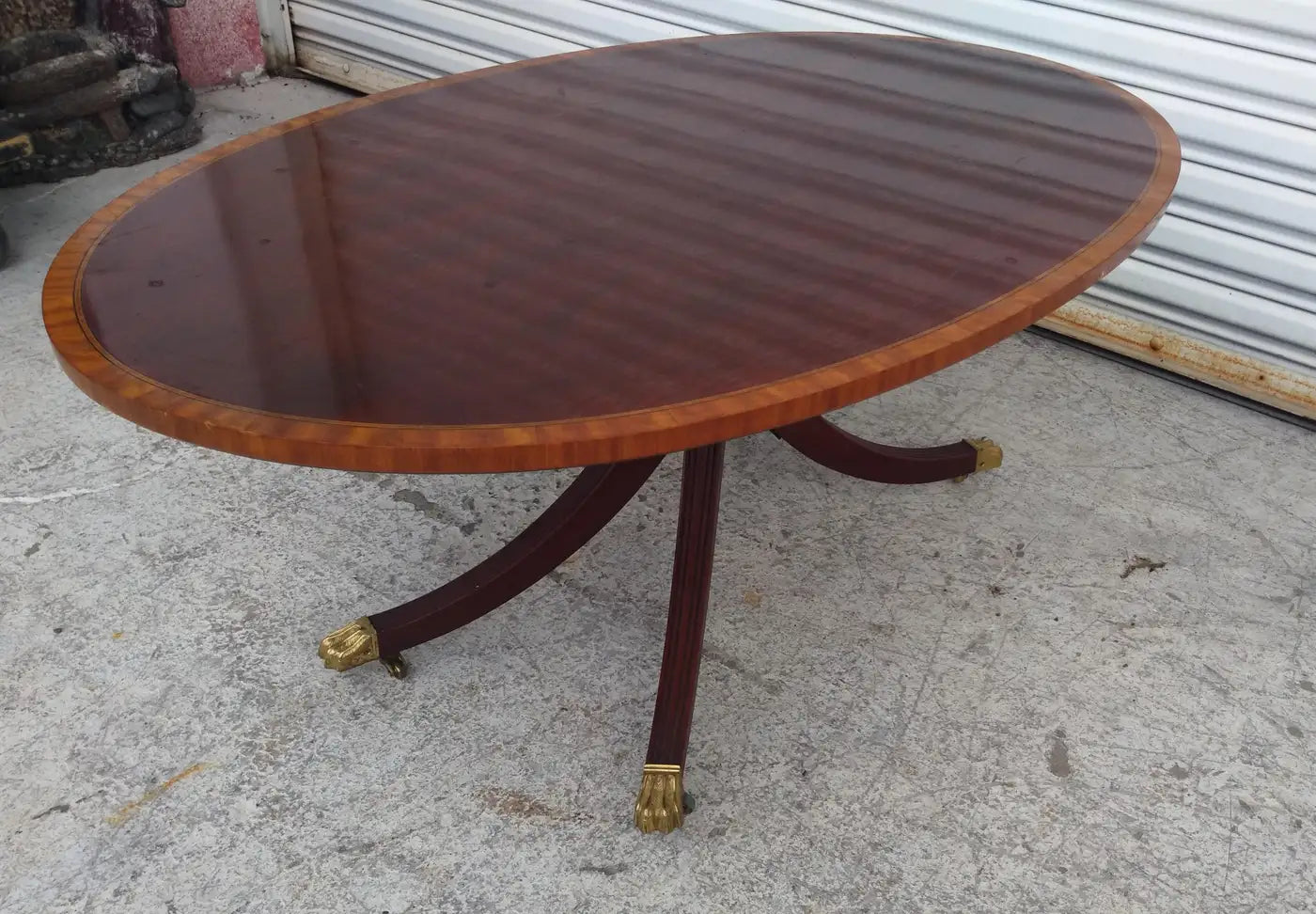 Antique-style Duncan Phyfe coffee table in living room