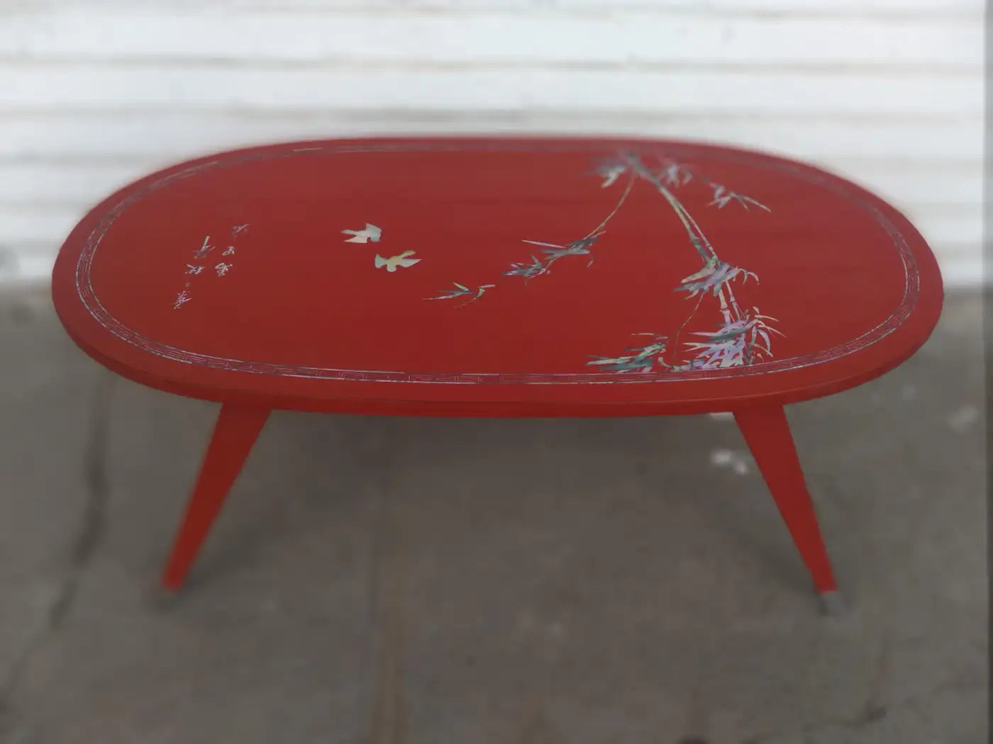 Elegant Chinese folding leg coffee table with pearl inlay