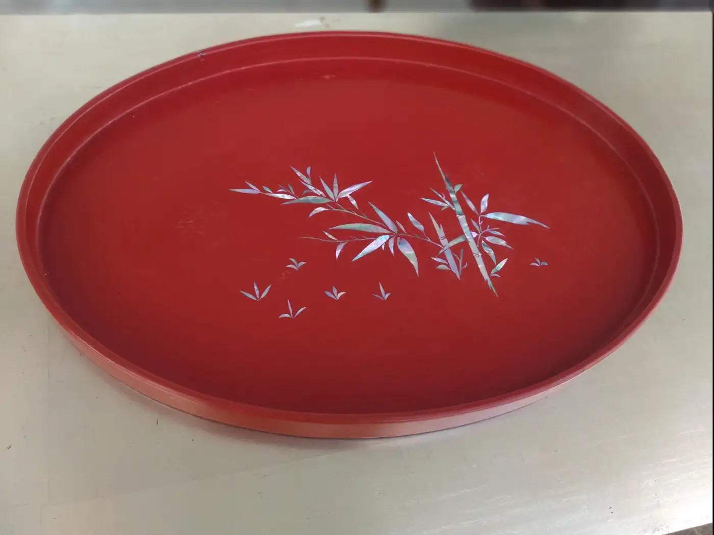 Decorative red lacquer Chinese tray with pearl inlay detail