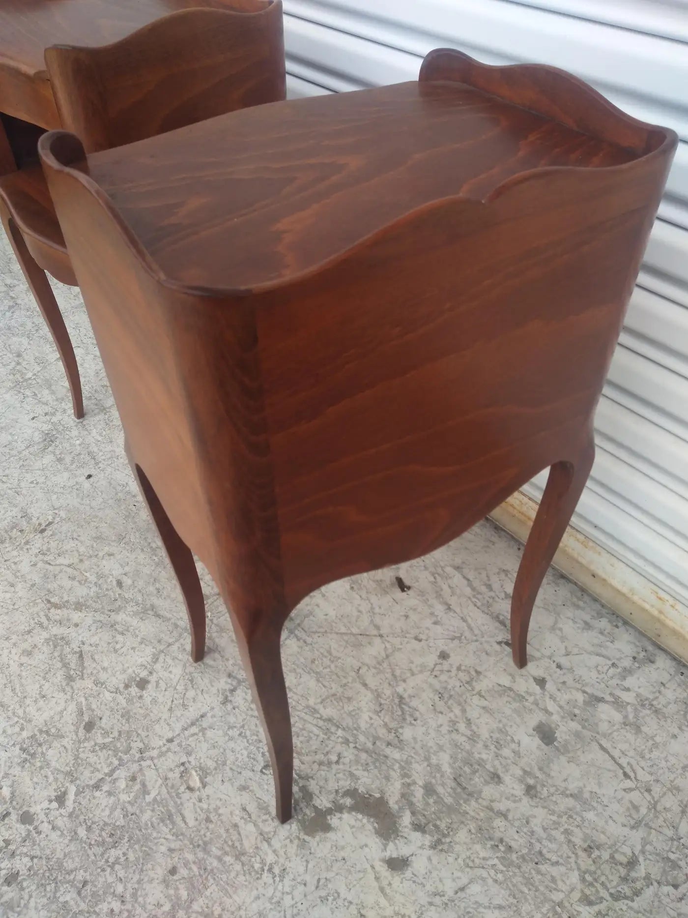 Pair of antique walnut French Provincial nightstands