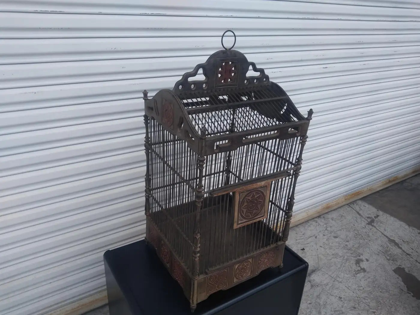 Ornate large vintage bird cage in metal