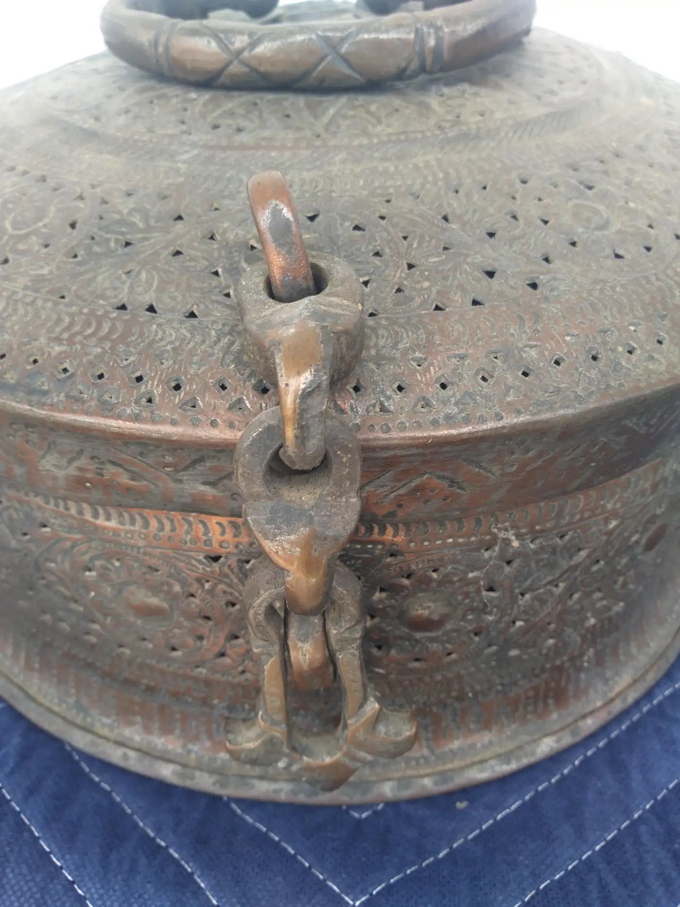 Decorative pierced copper box from India with tinned finish
