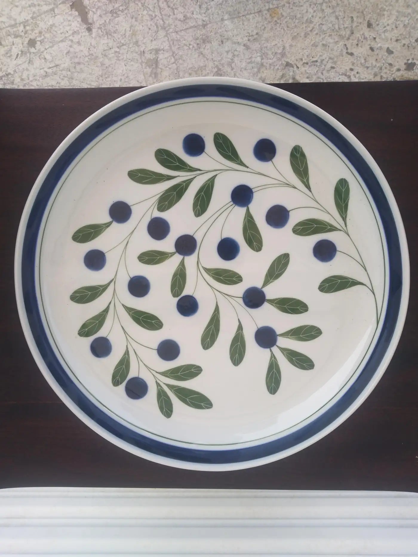 Decorative ceramic platter with fruit motif