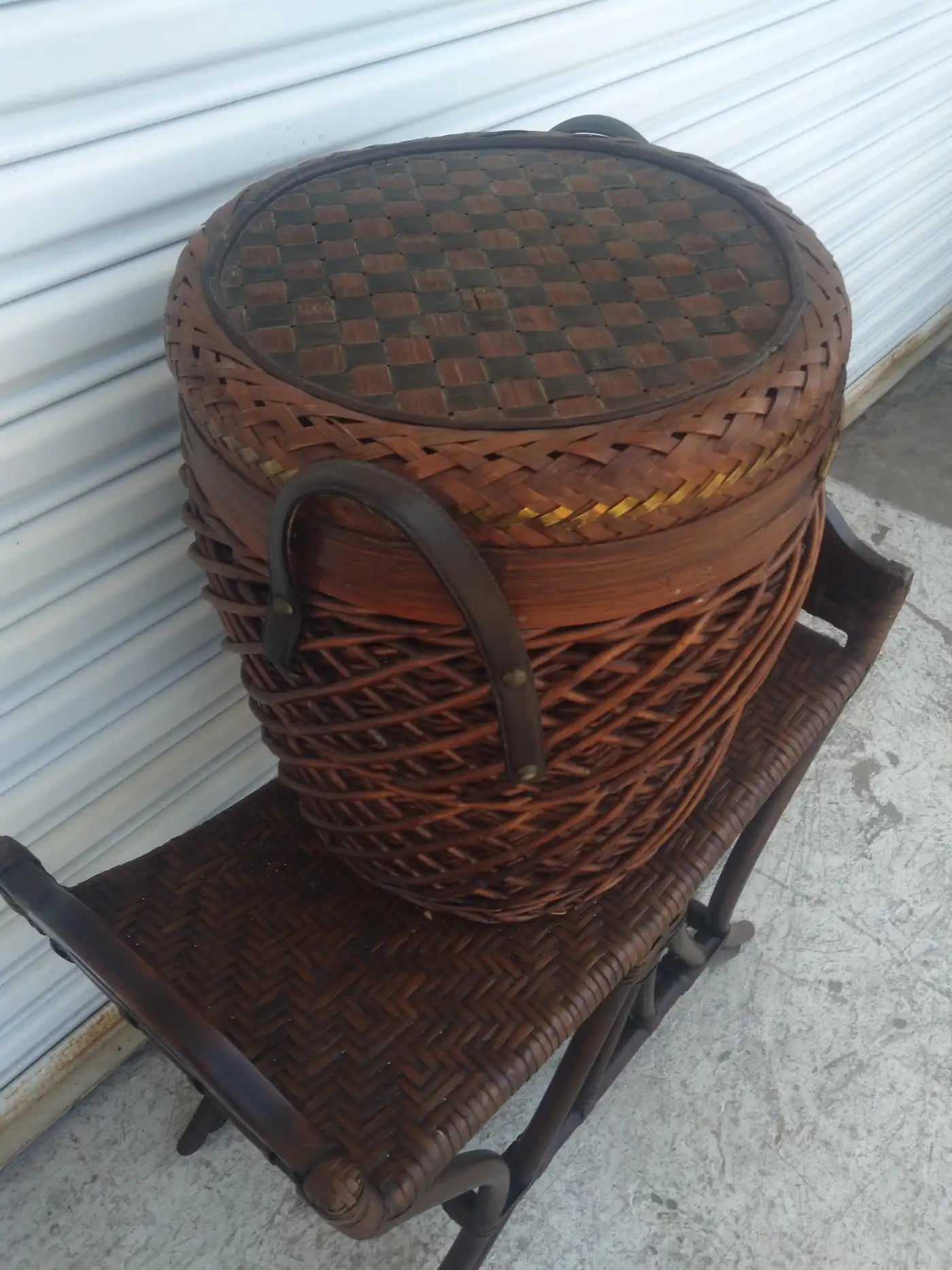Boho chic wicker basket featuring brass inlay design