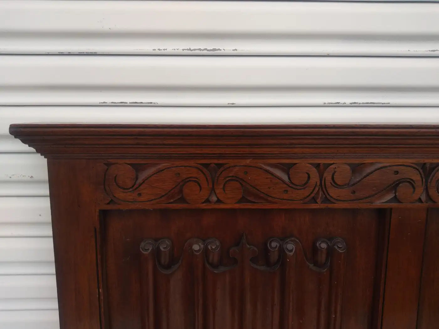Vintage style mahogany headboard with scroll details