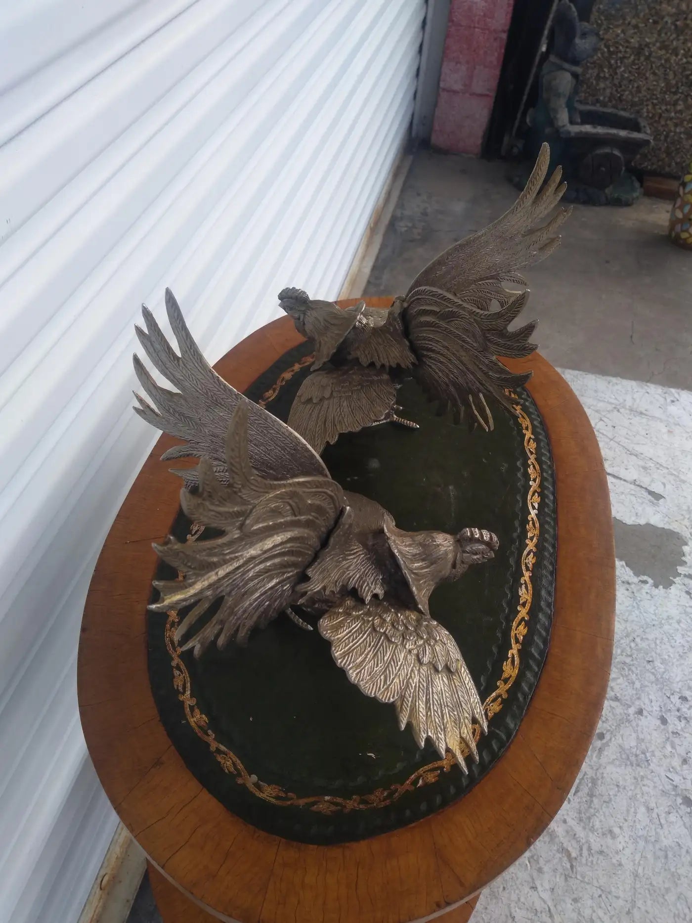 Cast metal rooster pair in combat pose