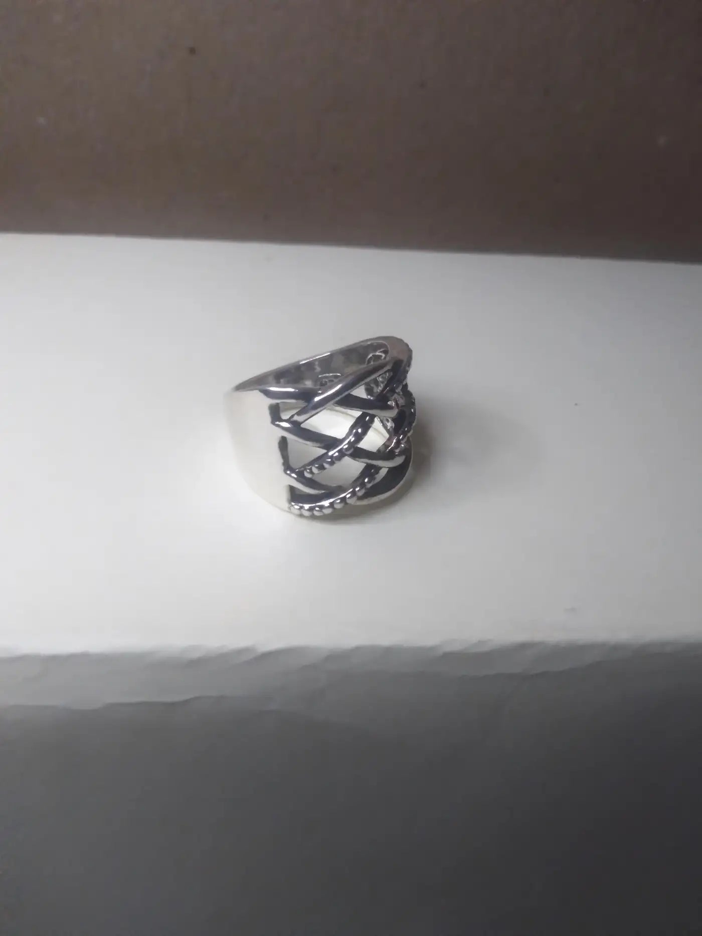 Handmade woven sterling silver band ring