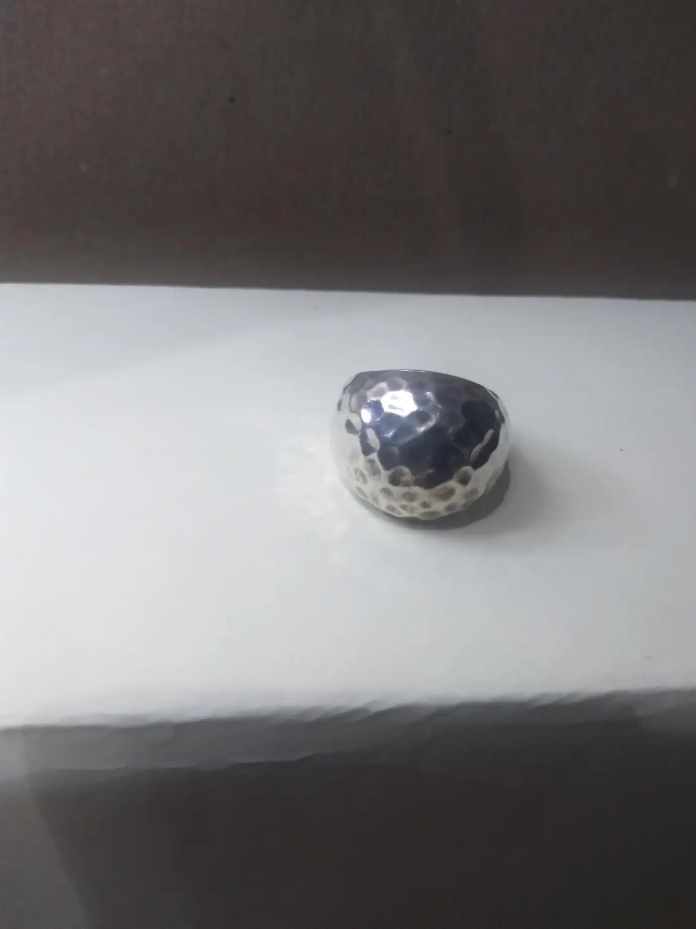 Handmade sterling silver ring with textured design