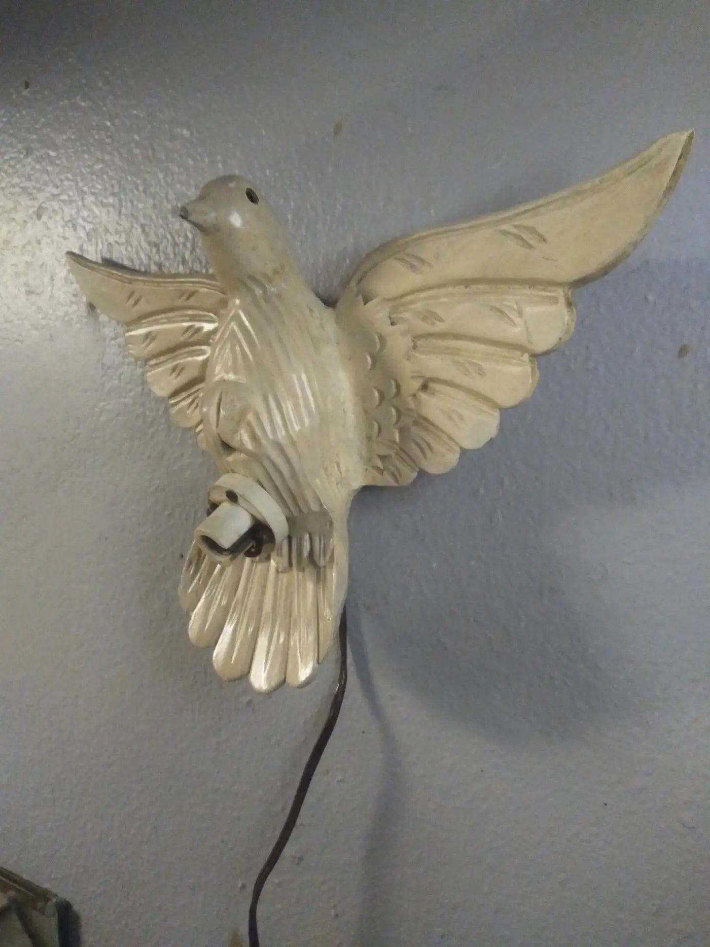 Vintage-style carved wood dove wall lamp