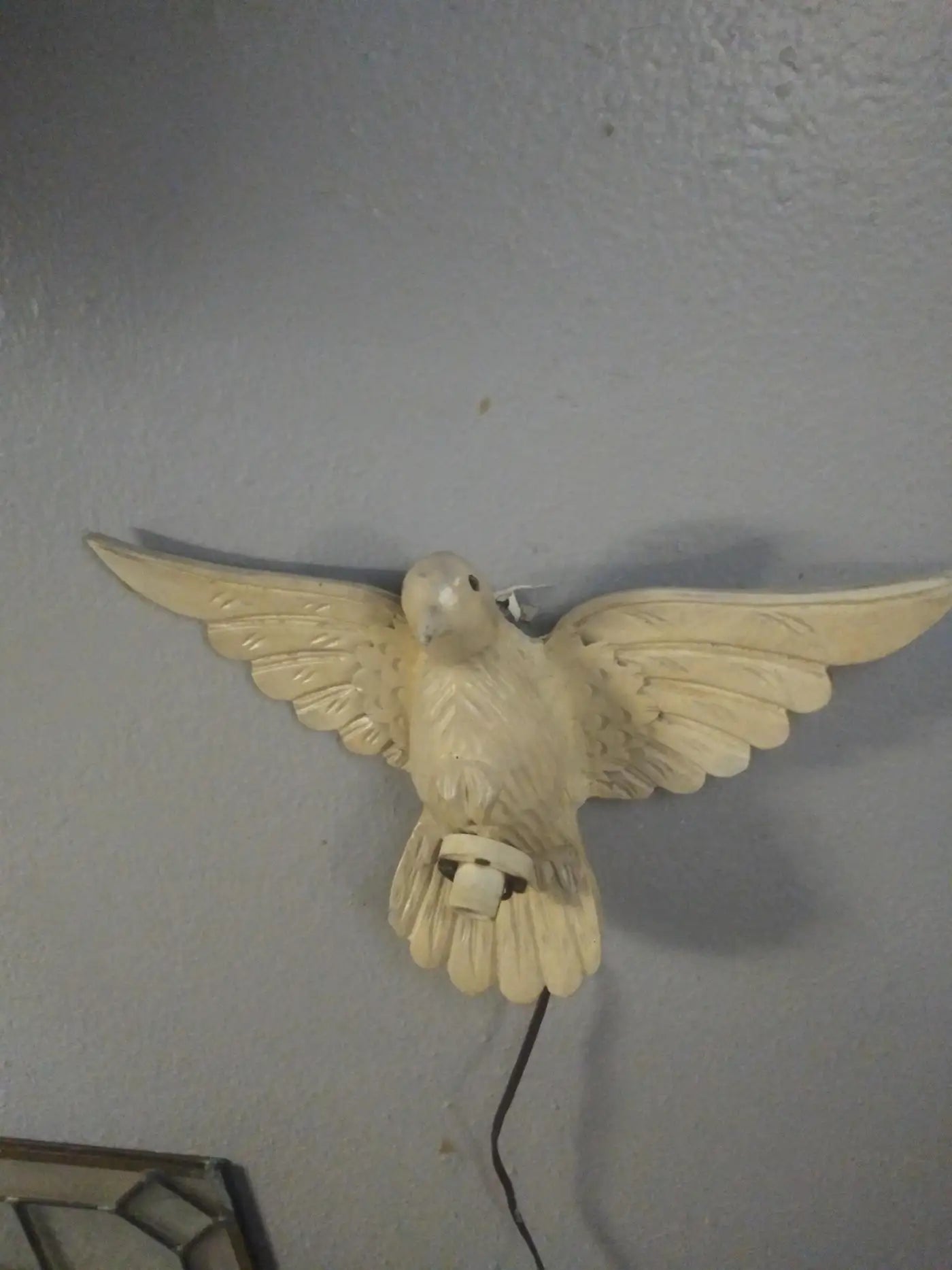 Farmhouse wall lamp with carved dove design
