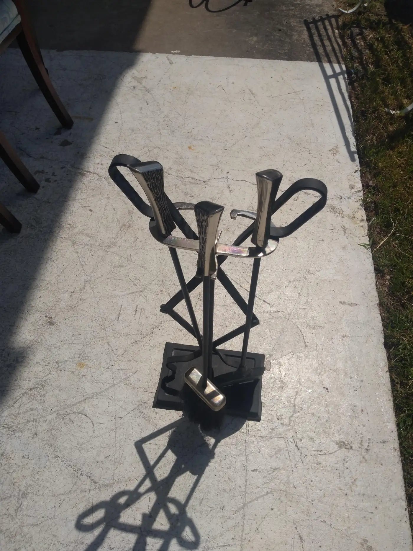 Fireplace poker set with stylish nickel handles