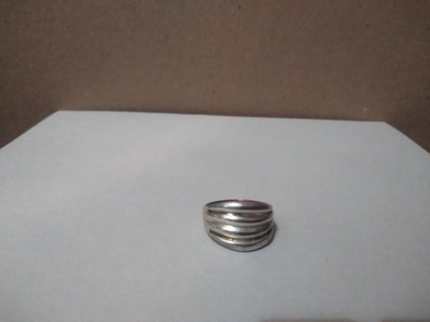 Gold and silver pierced wave design ring