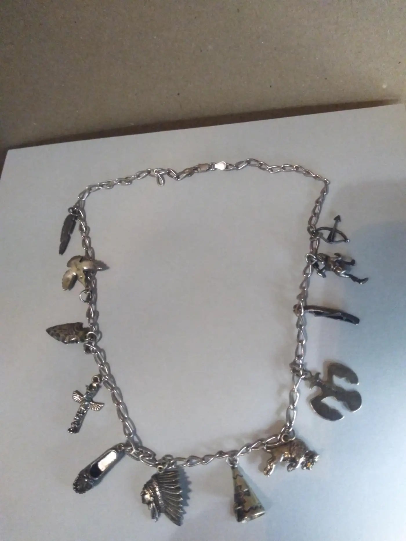 Sterling silver charm necklace with vintage accents