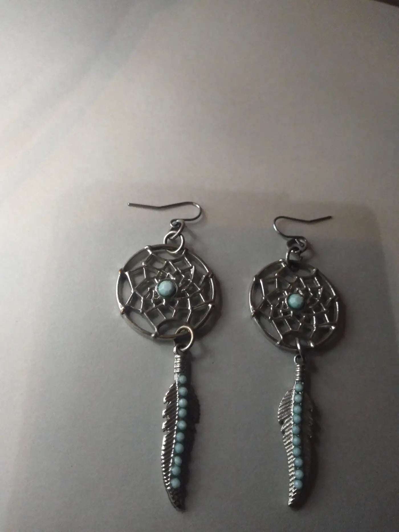 Native American silver earrings with dreamcatcher design