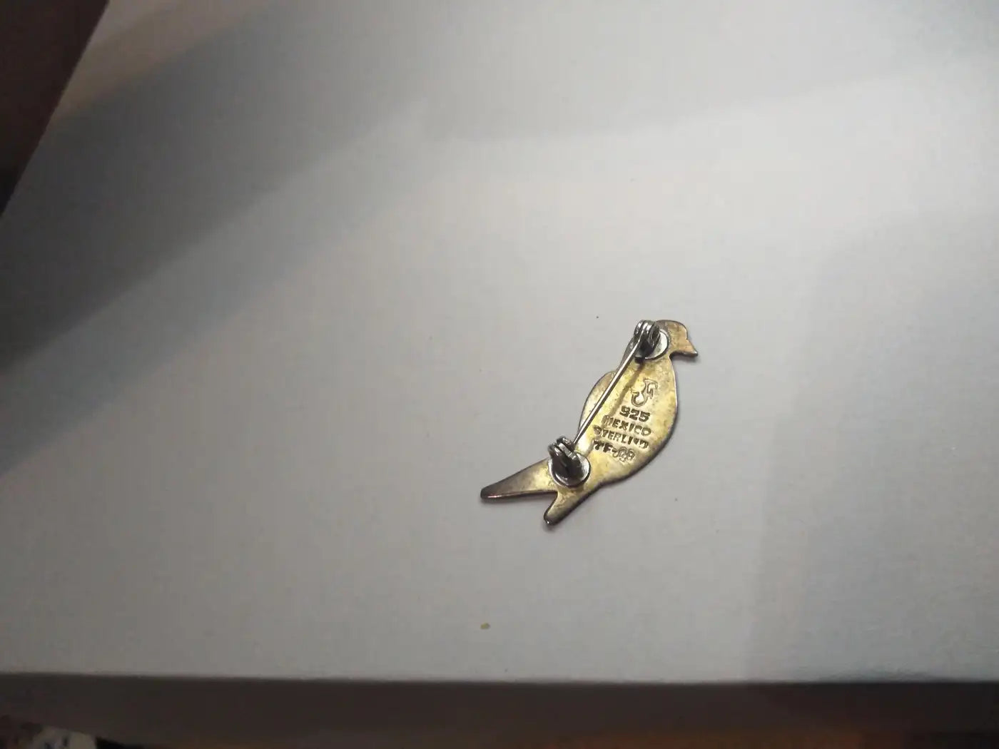 Handcrafted Mexican parrot brooch