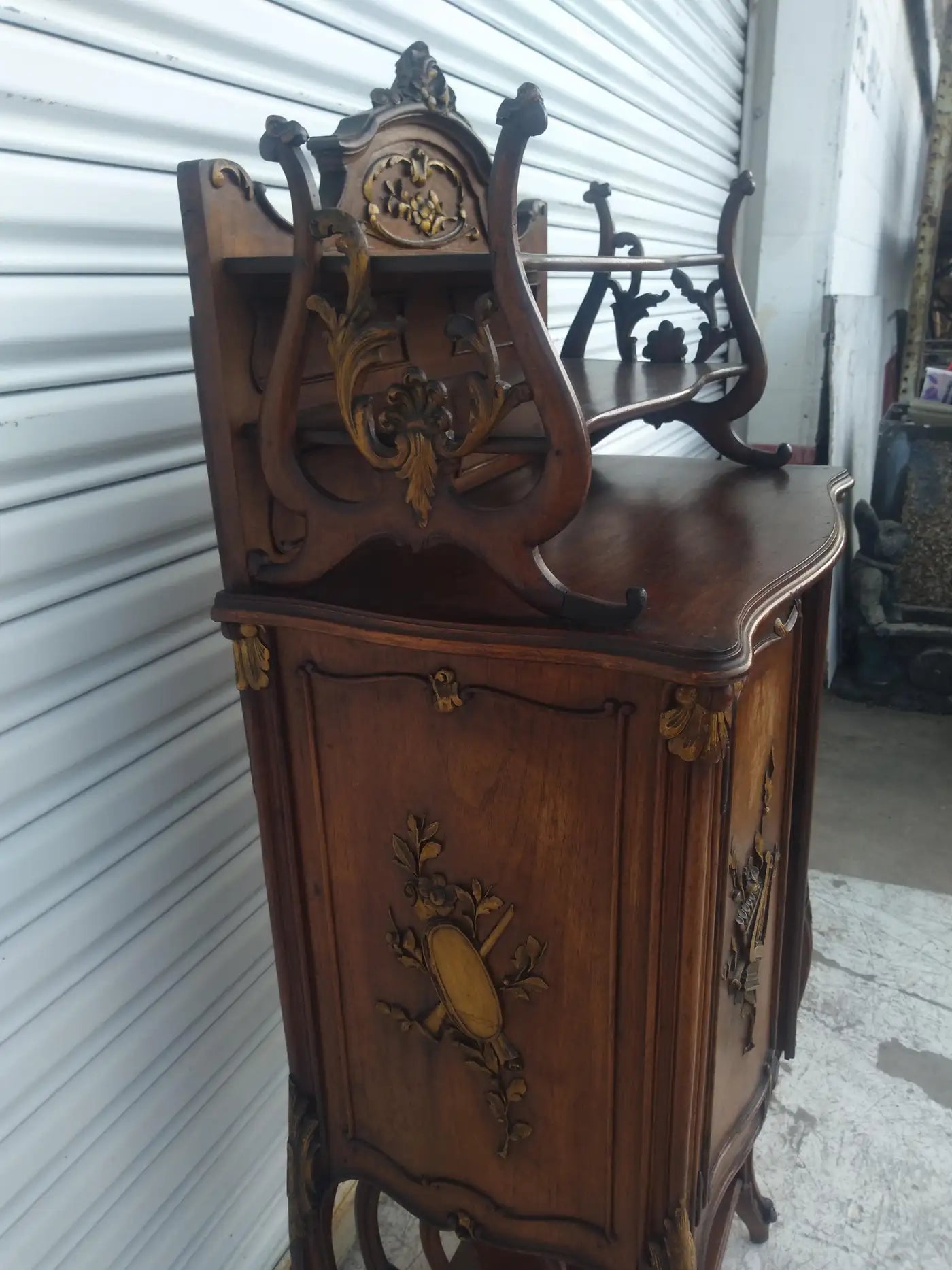 19th century walnut music cabinet with ornate details