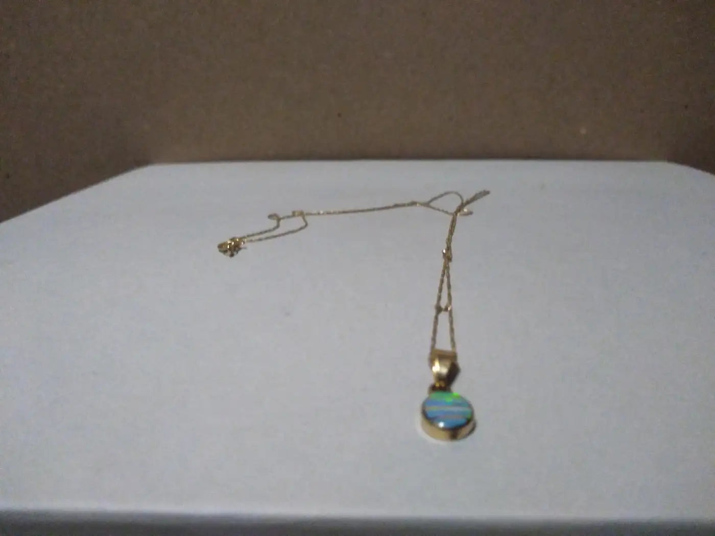 Real opal pendant on 14k gold chain