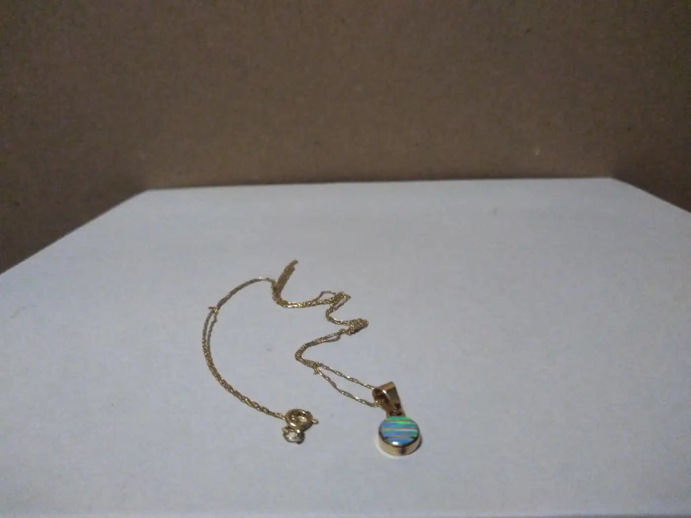 Elegant opal jewelry on gold chain