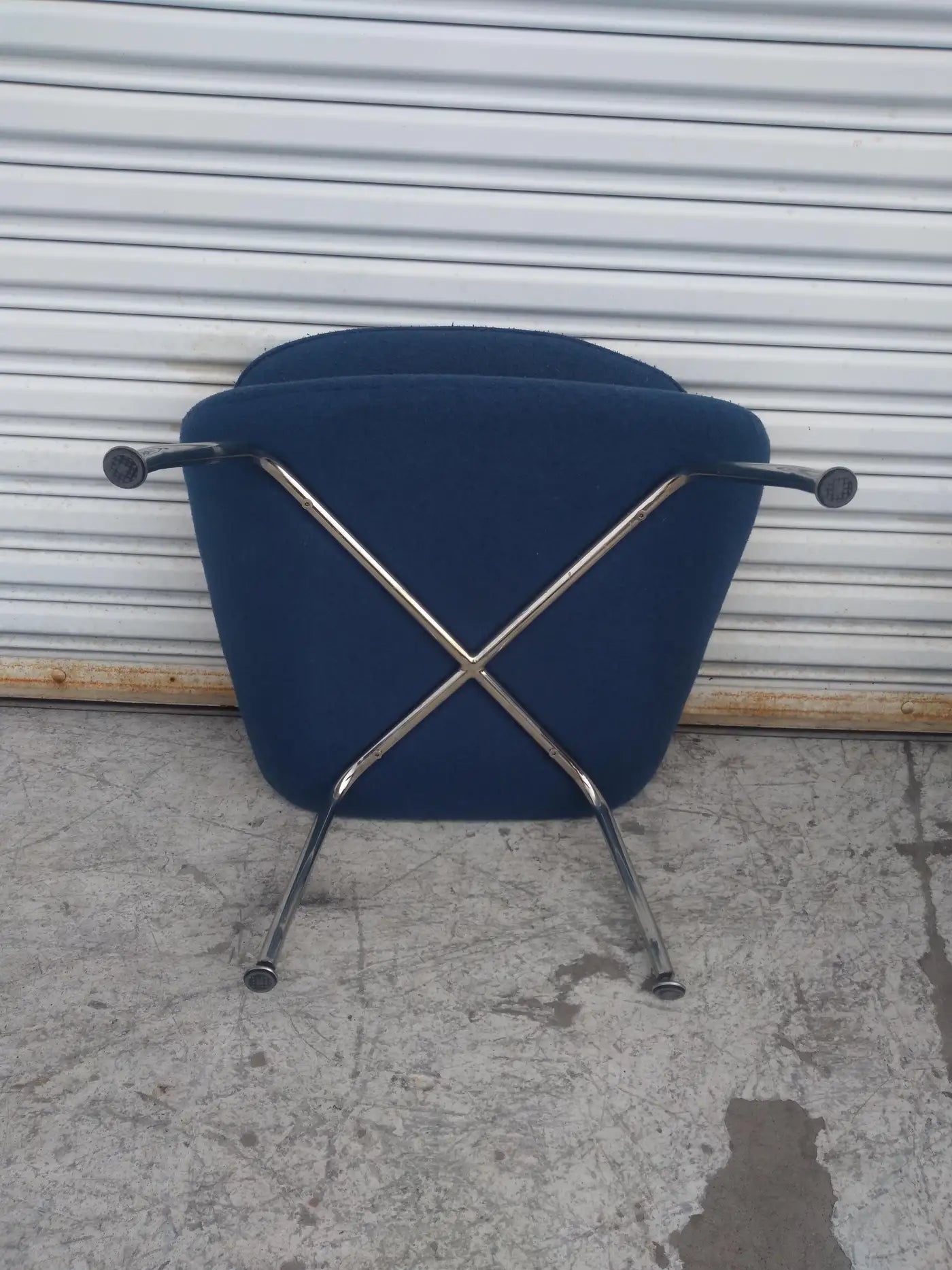 Classic modern womb chair set in room interior