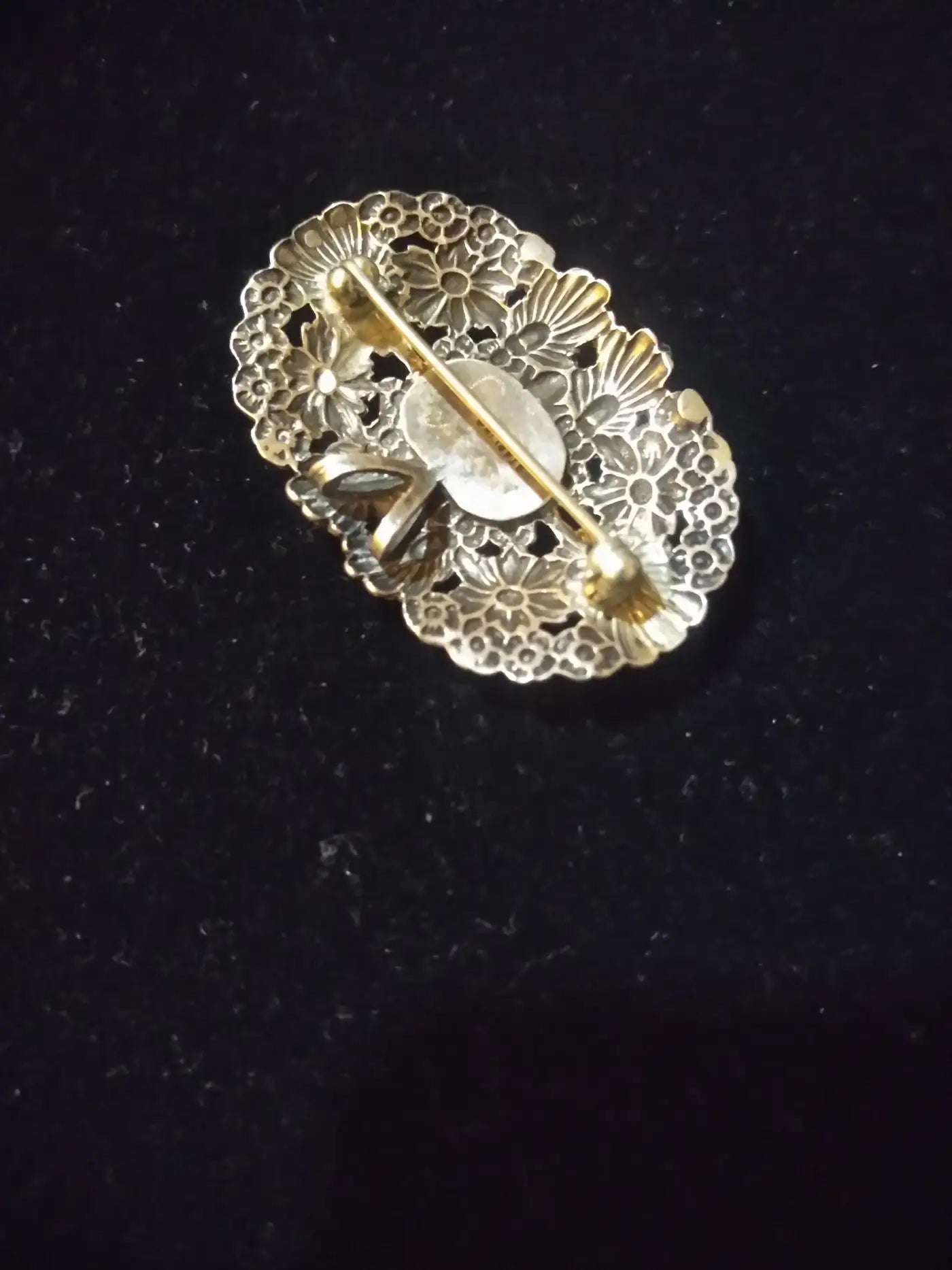 Turquoise brooch with Native American design