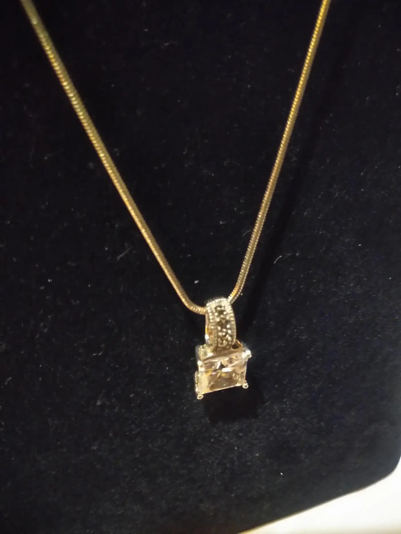 Princess cut cubic zirconia pendant on silver chain