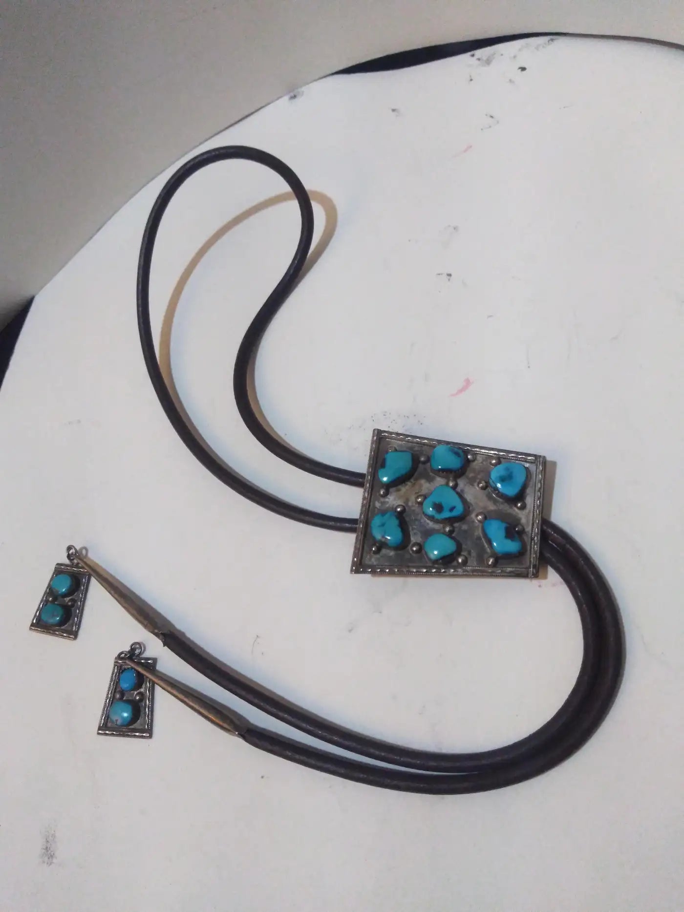 Leather, Sterling Silver and Turquoise Native American Bolo Tie