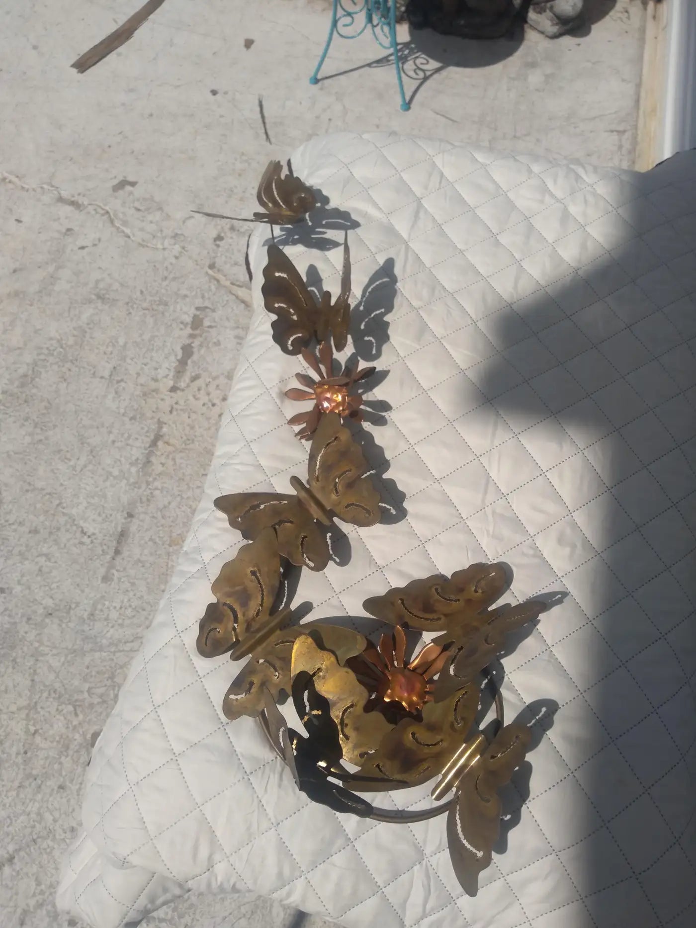 Sculptural metal and brass wall decor