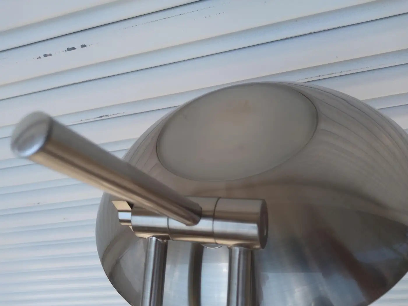 Elegant modern adjustable floor lamp in brushed nickel