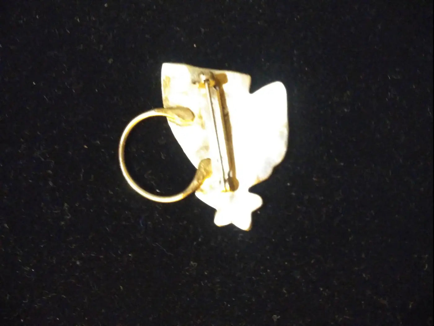 Silver basket brooch with gold accents