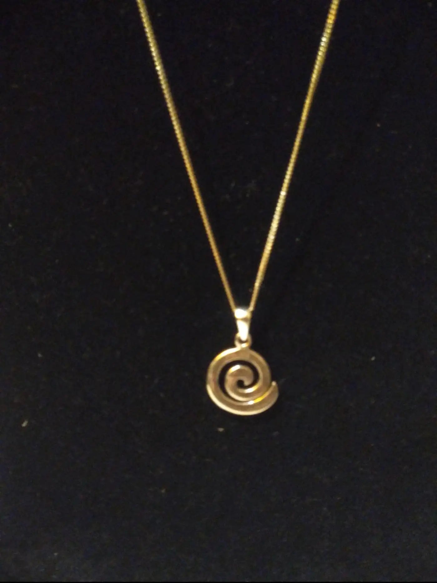 18" silver necklace with artistic swirl pendant