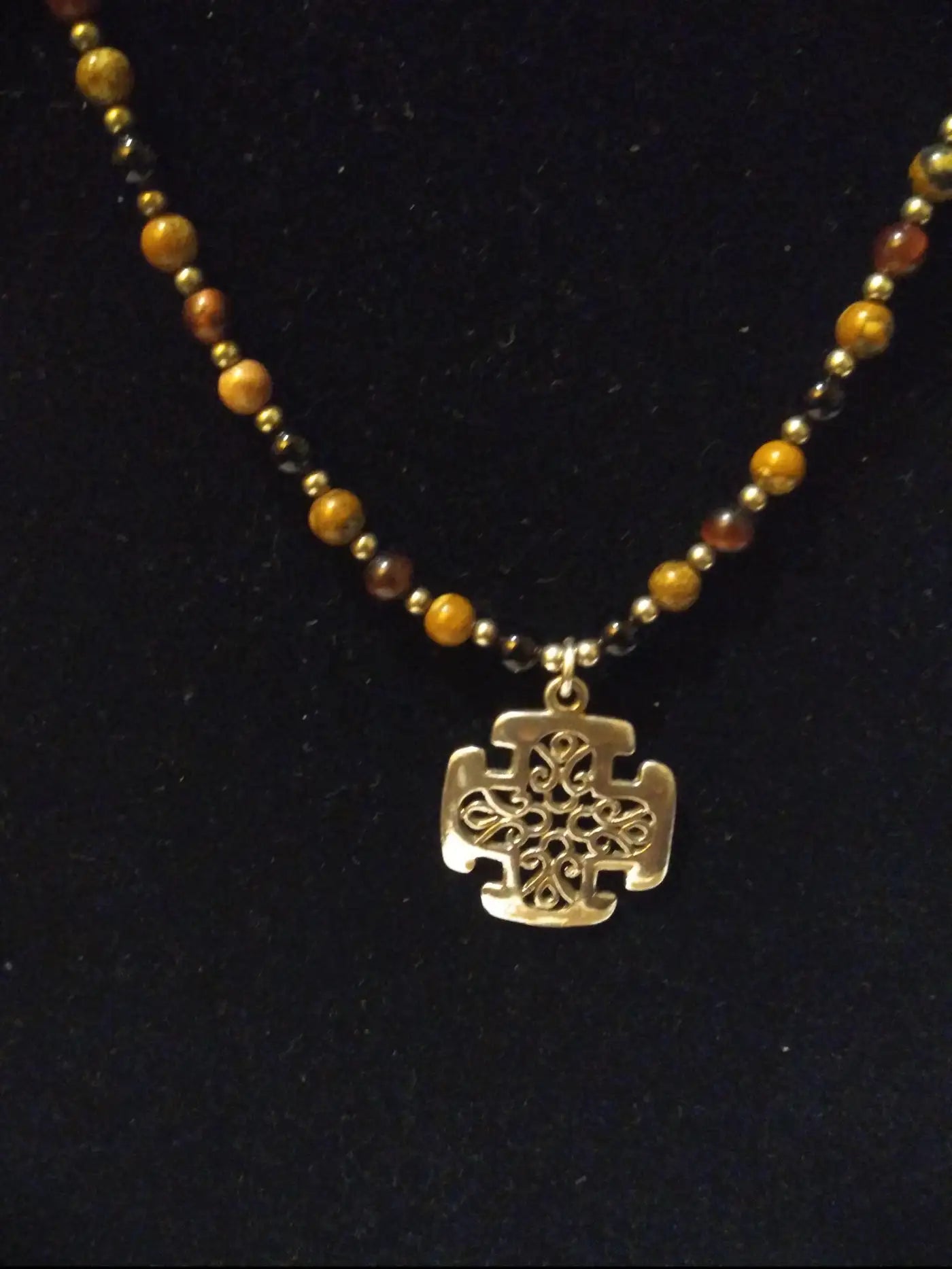 Sterling silver pendant necklace with intricate beaded details