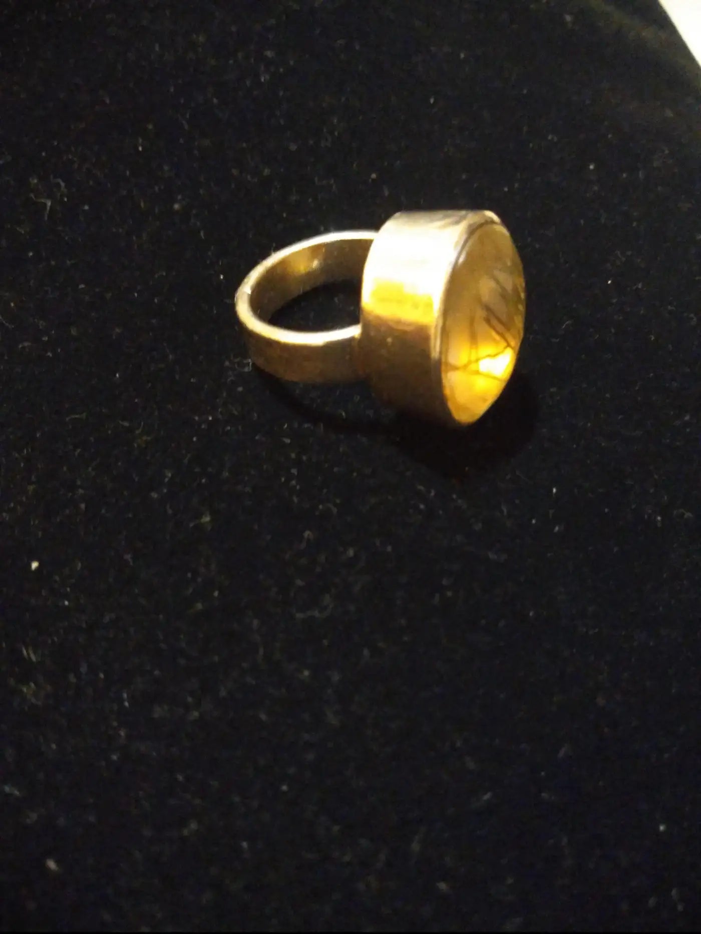 Elegant sterling silver ring with rutilated quartz