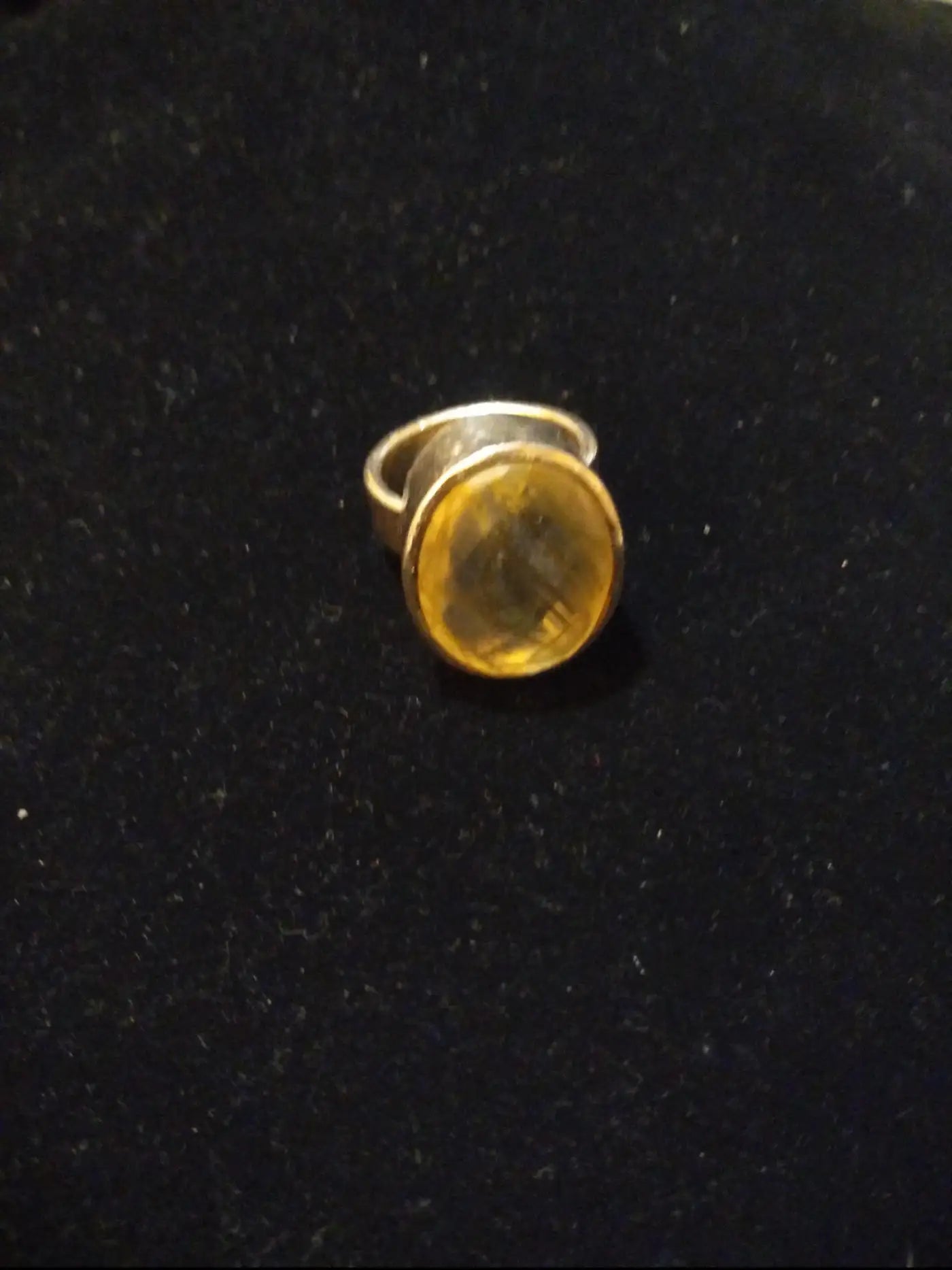 Sterling silver ring featuring a unique rutilated quartz stone
