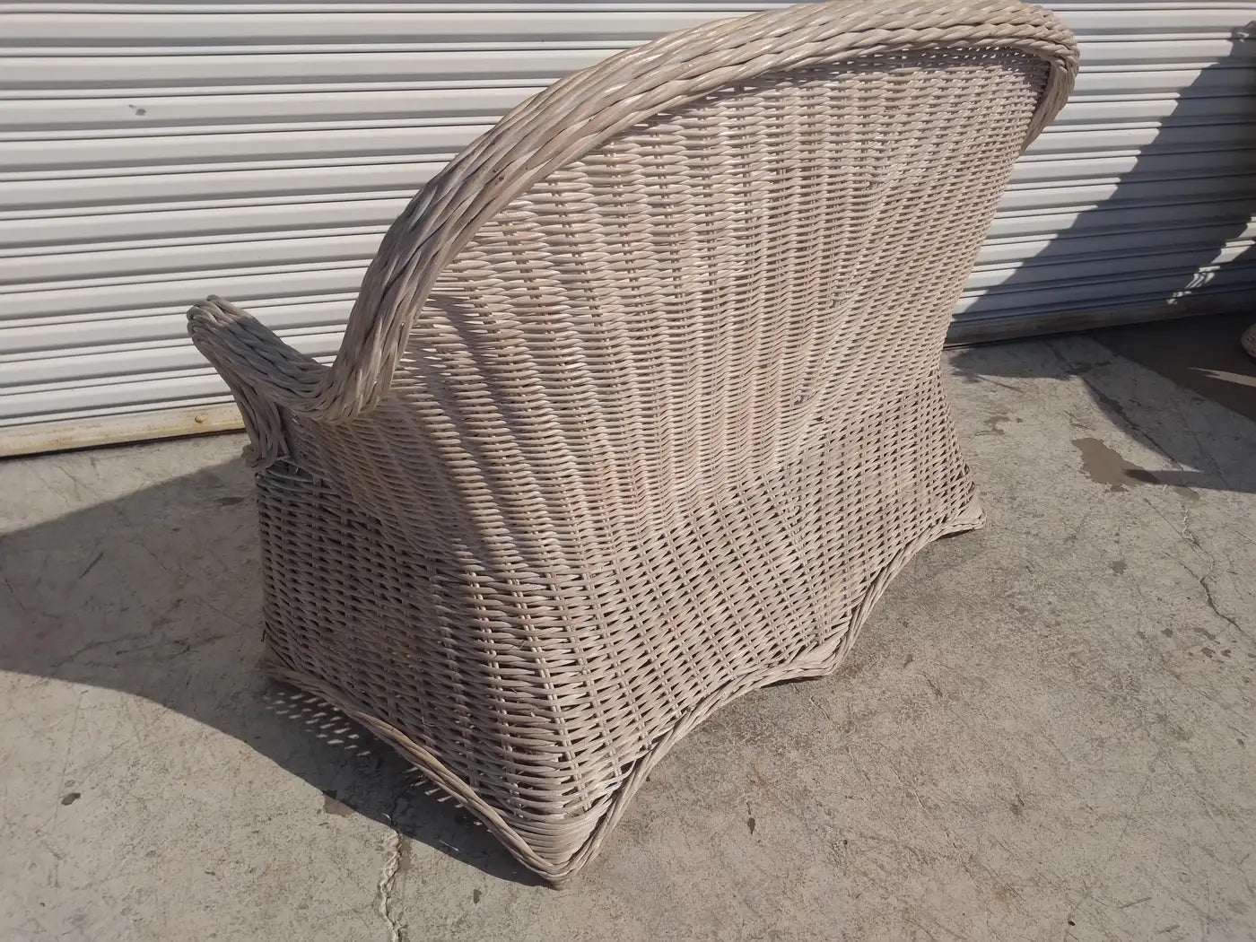 Two-seater bamboo and rattan boho settee