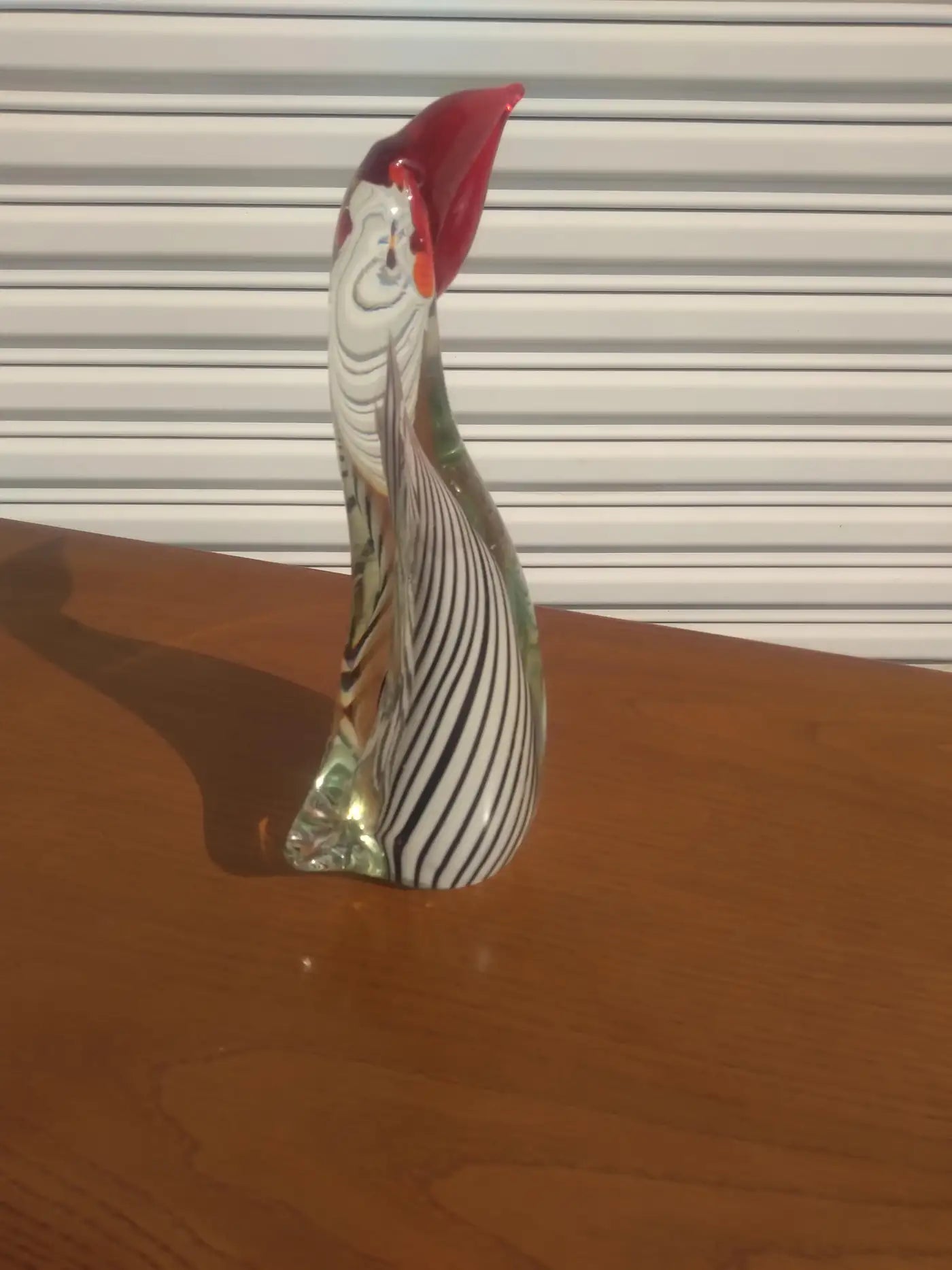 Vibrant tropical bird glass sculpture